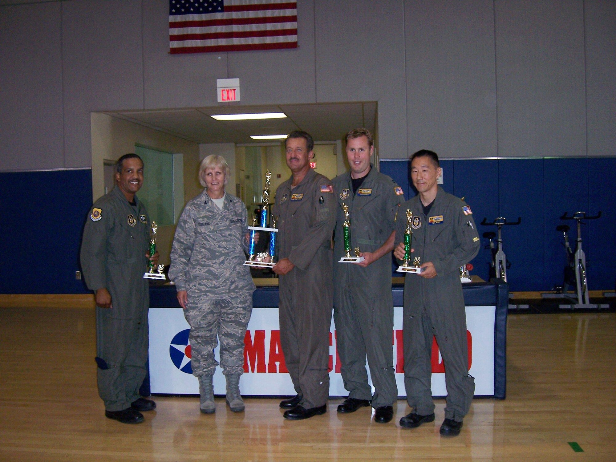 Col. Pam LeBlanc, commander, 452 MSG, presented awards to the 2008 Intramural Golf Champs -- 729 AS -- at the March ARB Fitness Center. (U.S. Air Force photo by Will Alexander, 452 AMW/PA)