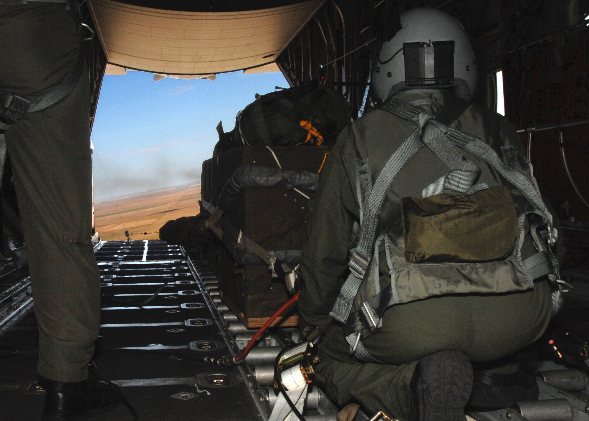 CANNON AIR FORCE BASE N.M.-- Airman 1st Class William Kersey, a loadmaster from the 73rd Special Operations Squadron, gets ready to pull the manual release lever on the bomb rack if the electrical release system does not work Sept. 24 aboard a MC-130W Combat Spear. This kind of drop would be performed in a drop zone where landing is not an option. (U.S. Air Force photo by Airman Maynelinne De La Cruz)