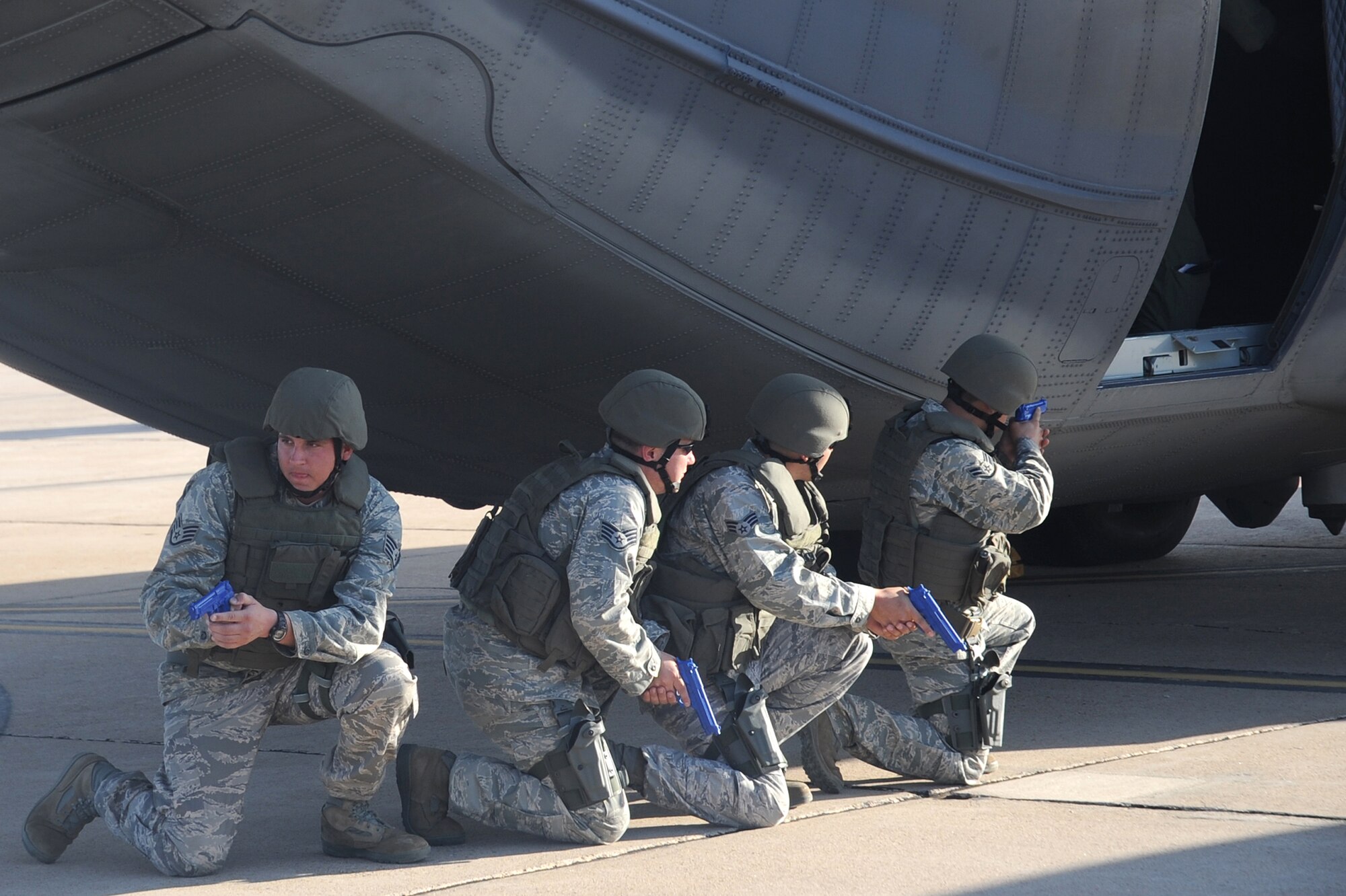 CANNON AIR FORCE BASE, N.M. -- 27th Special Operations Security Forces Squadron Airmen practice combative skills training on the flightline Oct. 2. The training prepares Airmen for armed, close-quarters combat and enables the operator to escalate the level of force needed to respond to deadly encounters. (U.S. Air Force photo/Senior Airman Liliana Moreno)