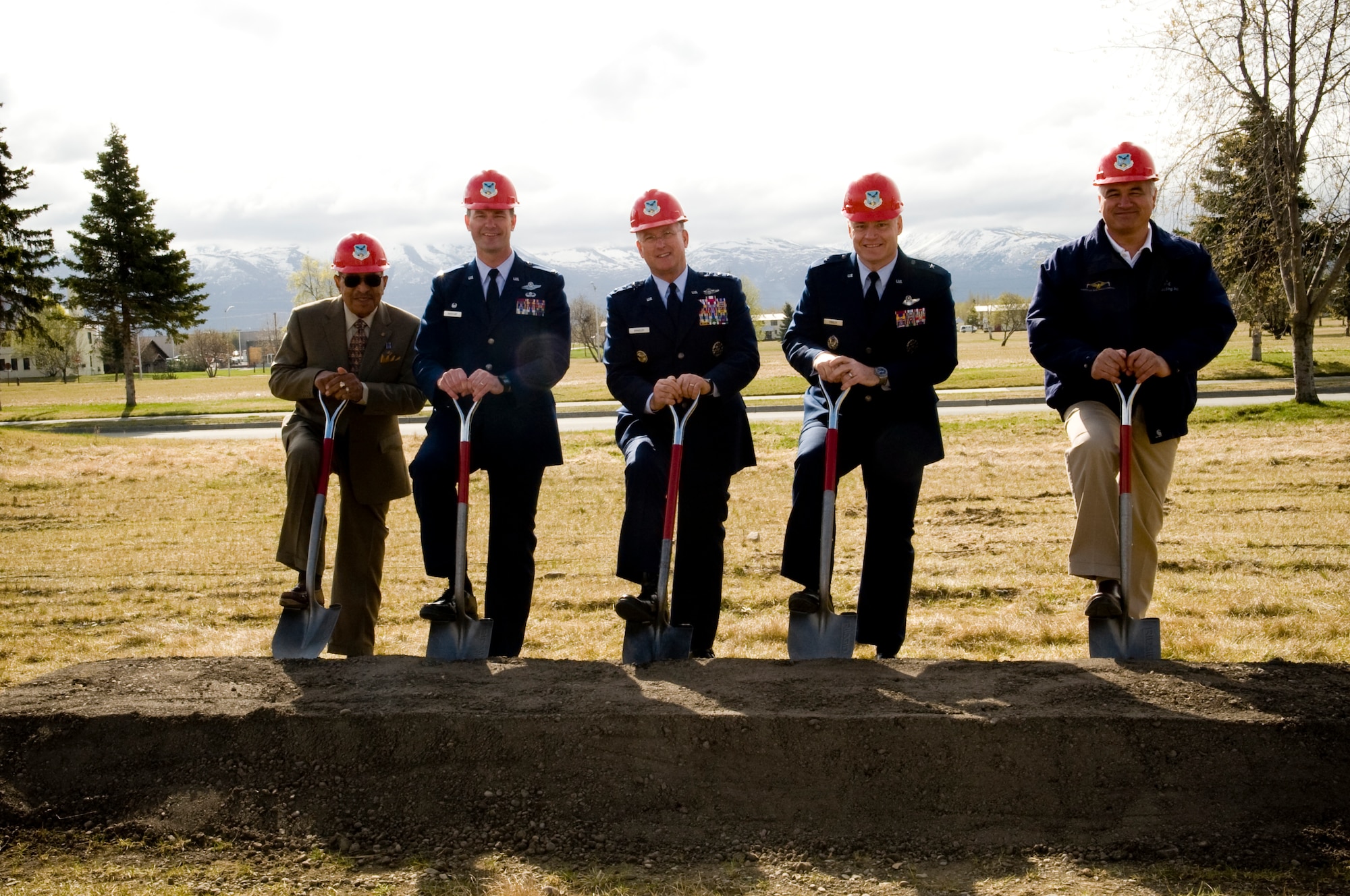 Elmendorf AFB leadership and invited guests participated in the 477th Fighter Group Ground Breaking Ceremony on May 19 for Alaska's only Reserve unit.  The building is scheduled to be completed in October 2009. The 477th Fighter Group is Air Force Reserve Command's first F-22A Raptor unit. (U.S.Air Force Photo by Tech. Sgt. Alan Port)