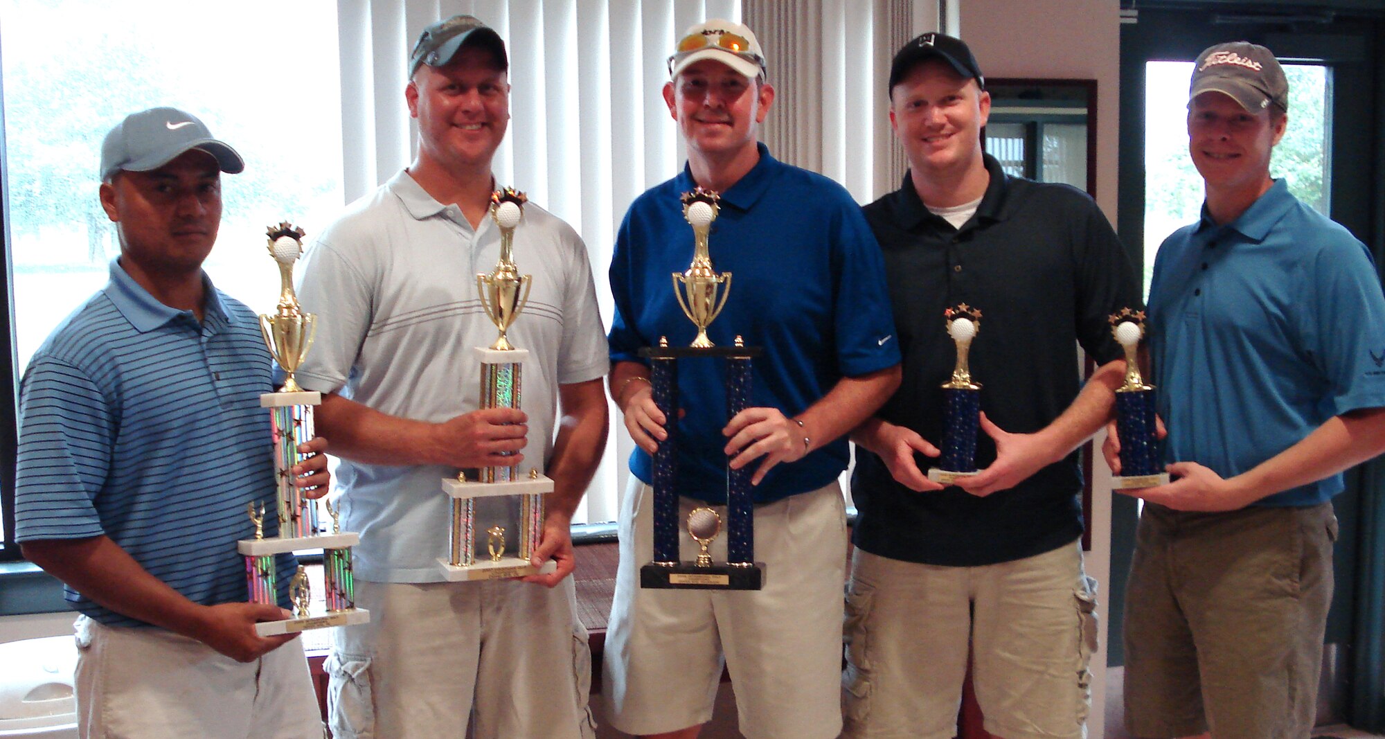 DOVER AIR FORCE BASE, Del. – The 9th Airlift Squadron won the 2008 Golf Championship. The winners are: (Left to right) Tech. Sgt. John Crump, Tech. Sgt. Jacob Paulson, Tech. Sgt. Steve Dirksen, 1st Lt. Ryan Ness and Capt. Joel Theisen. The 9th AS has won the Golf Championship three years in a row. (Courtesy Photo)