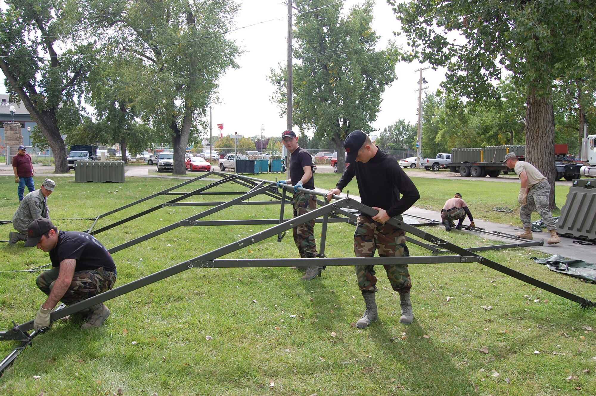 About a dozen members of the 341st Civil Engineer Squadron volunteered their time and effort to assemble military tents at the Great Falls Fair Grounds Sept. 25.  The tents and volunteers came from Malmstrom Air Force Base to support the second annual “Stand Down,” an event geared toward helping homeless veterans receive free medical check-ups, military clothing and supplies, and a free meal.    (U.S. Air Force photo/Senior Airman Eydie Sakura)