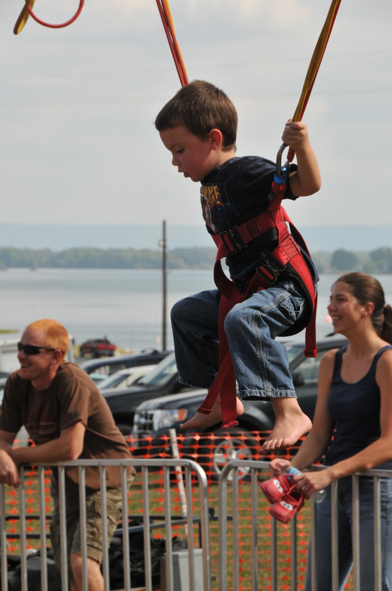 The Quad Bungee Jump was an attraction many could not resist. Here, a child attending the Sept. 28 bash ‘flies’ above the festivities.