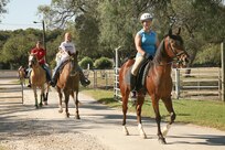 9/24/2008 - Members of the Lackland Saddle Club ride their horses on one of the trails located behind the stables. (USAF photo by Robbin Cresswell)