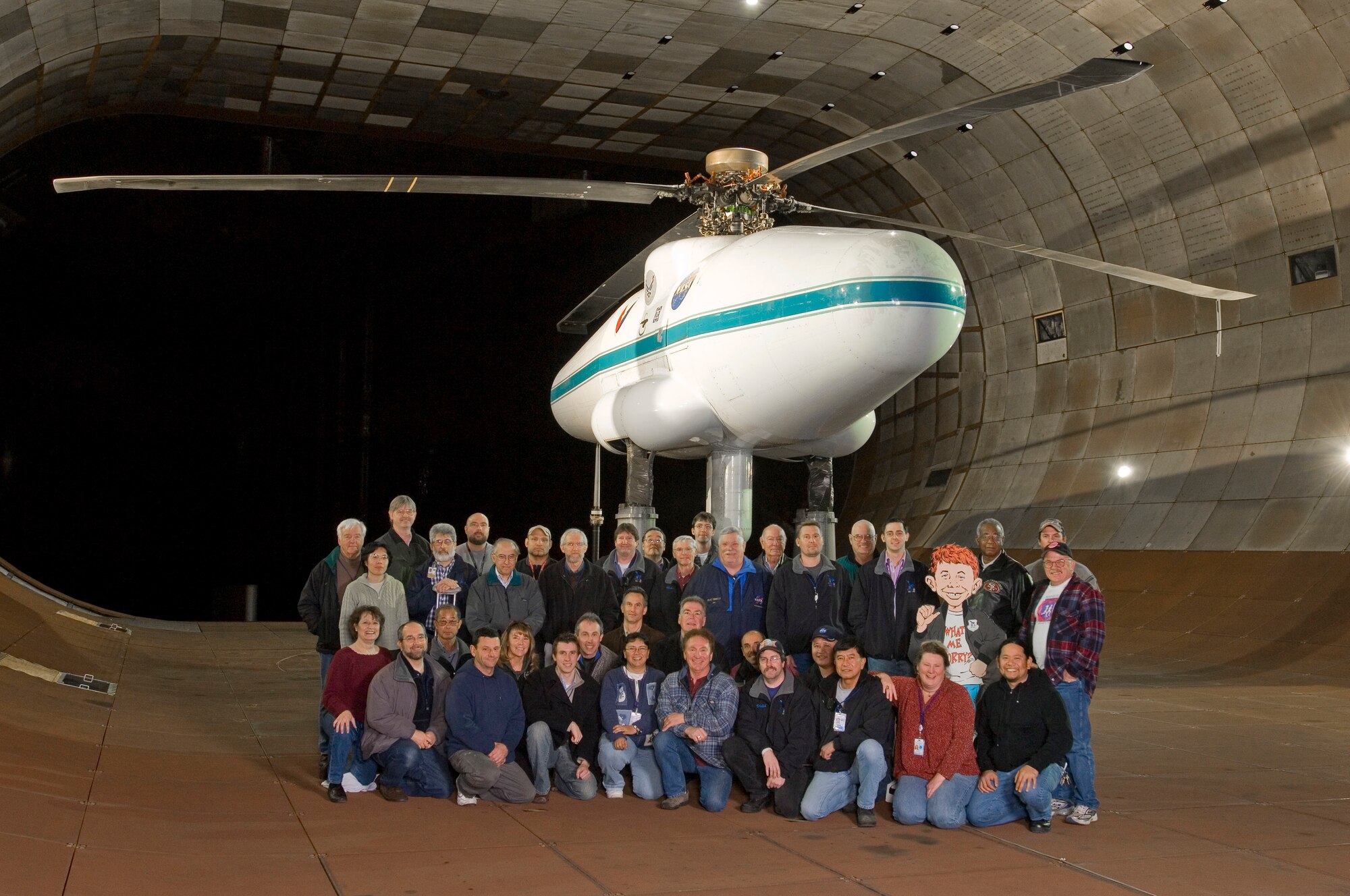 AEDC UH-60/Large Rotor Test Apparatus Checkout Test Team in 40- by-80-foot wind tunnel. (Photo provided)