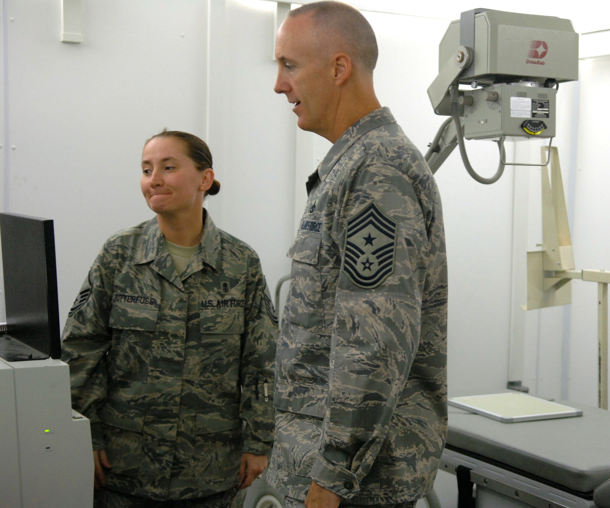 MANAS AIR BASE, KRYGYZ REPUBLIC -- Chief Master Sgt. Kevin Soltis, 376th Air Expeditionary Wing Command Chief, talks with Master Sgt. Kelly Butterfuss, a medical technician with the 376th Expeditionary Medical Group, Oct. 2, while meeting with the medical group. Chief Soltis kicked off a one year assignment at Manas, Sept. 27, where he will serve as the senior enlisted advisor for the 376th AEW. (Air Force photo / Tech. Sgt. Michael Voss)