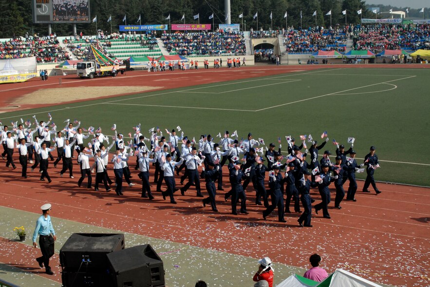 Airmen from Kunsan AB, Republic of Korea, march during the 46th Gunsan Citizens Day Citizens Parade, 01 October 2008. (U.S. Air Force photo/Senior Airman Dana Hill)