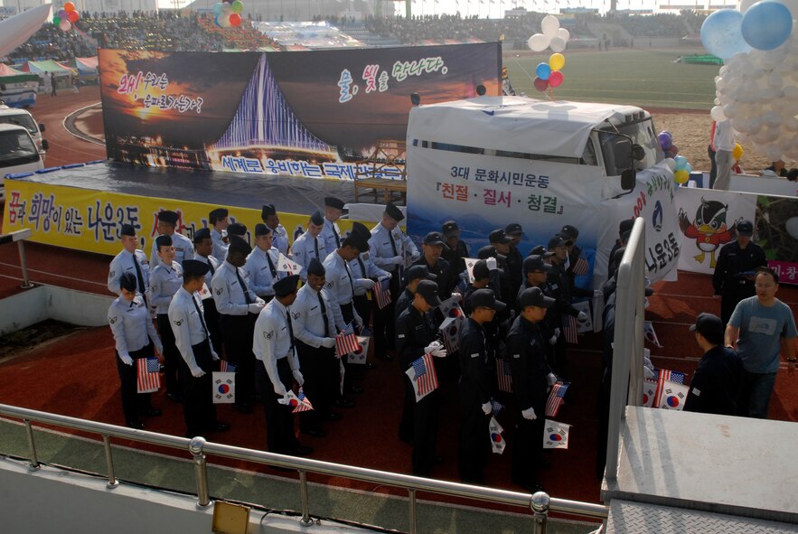 Airmen from Kunsan AB, Republic of Korea, prepare to march during the 46th Gunsan Citizens Day Citizens Parade, 01 October 2008. (U.S. Air Force photo/Senior Airman Dana Hill)
