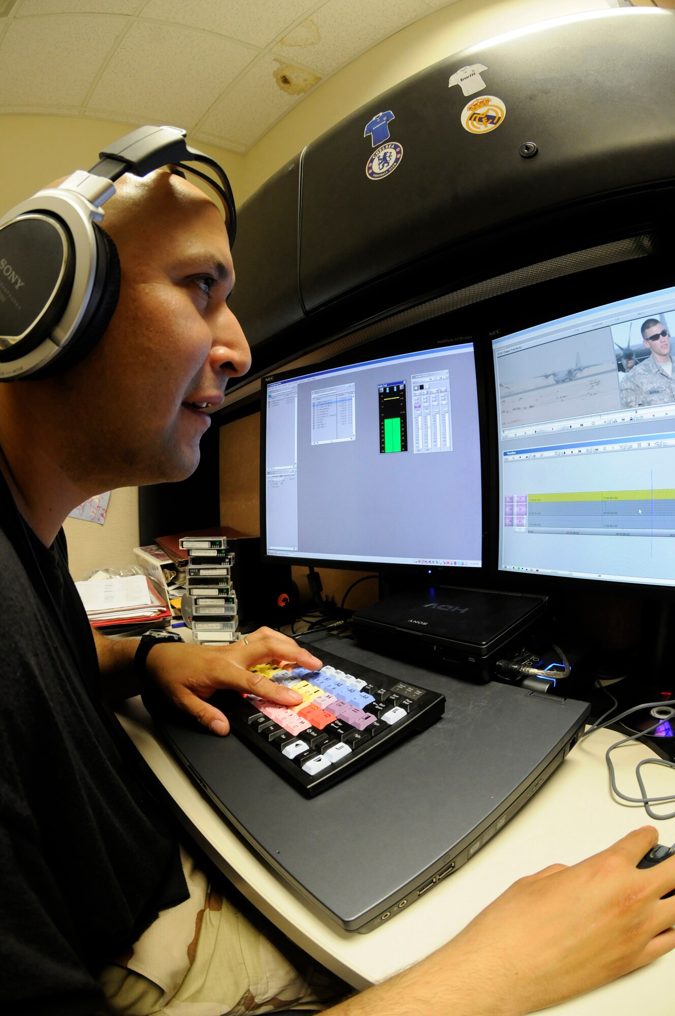 Staff Sgt. Pedro Jimenez, broadcaster assigned to the 379th Air Expeditionary Wing, edits a broadcast story Oct. 2, 2008, at an undisclosed air base in Southwest Asia. Broadcasters document Global War on Terror efforts and work to publicize the military's efforts to the American public. Sergeant Jimenez, a native of Guadalupe, Calif., is deployed from Andersen Air Force Base, Guam., in support of Operations Iraqi and Enduring Freedom and Joint Task Force-Horn of Africa. (U.S. Air Force photo by Staff Sgt. Darnell T. Cannady/Released)