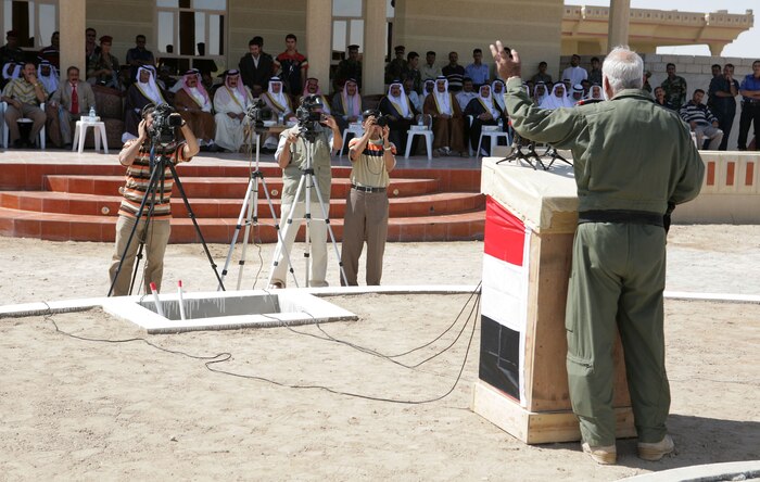 (KARMA, Iraq) General Sadun Talib ali Jumali, commander of the 5th Provincial Security Forces in Karmah, assures some of the most prominent leaders and sheiks of the Sahara tribe they will not be threatened by insurgents. The meeting Oct. 4, was the first since the June 26 suicide bombing that claimed a number of lives and injured many others, including Marines from 2nd Battalion, 3rd Marine Regiment. (Photo by Lance Cpl. Achilles Tsantarliotis)