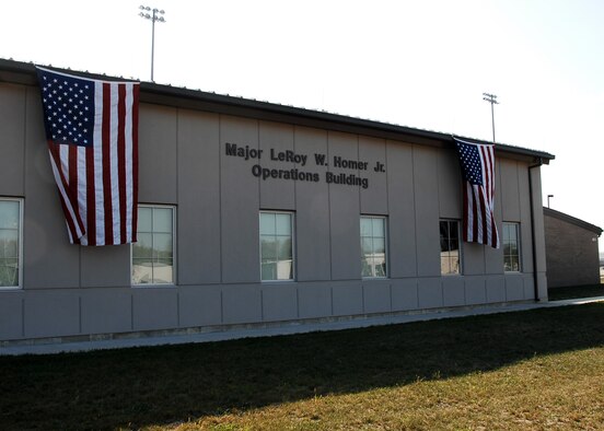 WRIGHT-PATTERSON AFB, Ohio -- The 445th Airlift Wing dedicated its Operations Building Oct. 4, 2008, in honor of Maj. LeRoy W. Homer, Jr., a member of the wing from 1995 to 2000.  Maj. Homer died Sept. 11, 2001, on board United Airlines Flight 93, when he was serving as the airplane’s first officer.  The purpose of the building dedication is to honor Maj. Homer’s life of exceptional service. (Air Force photo/Ben Strasser)