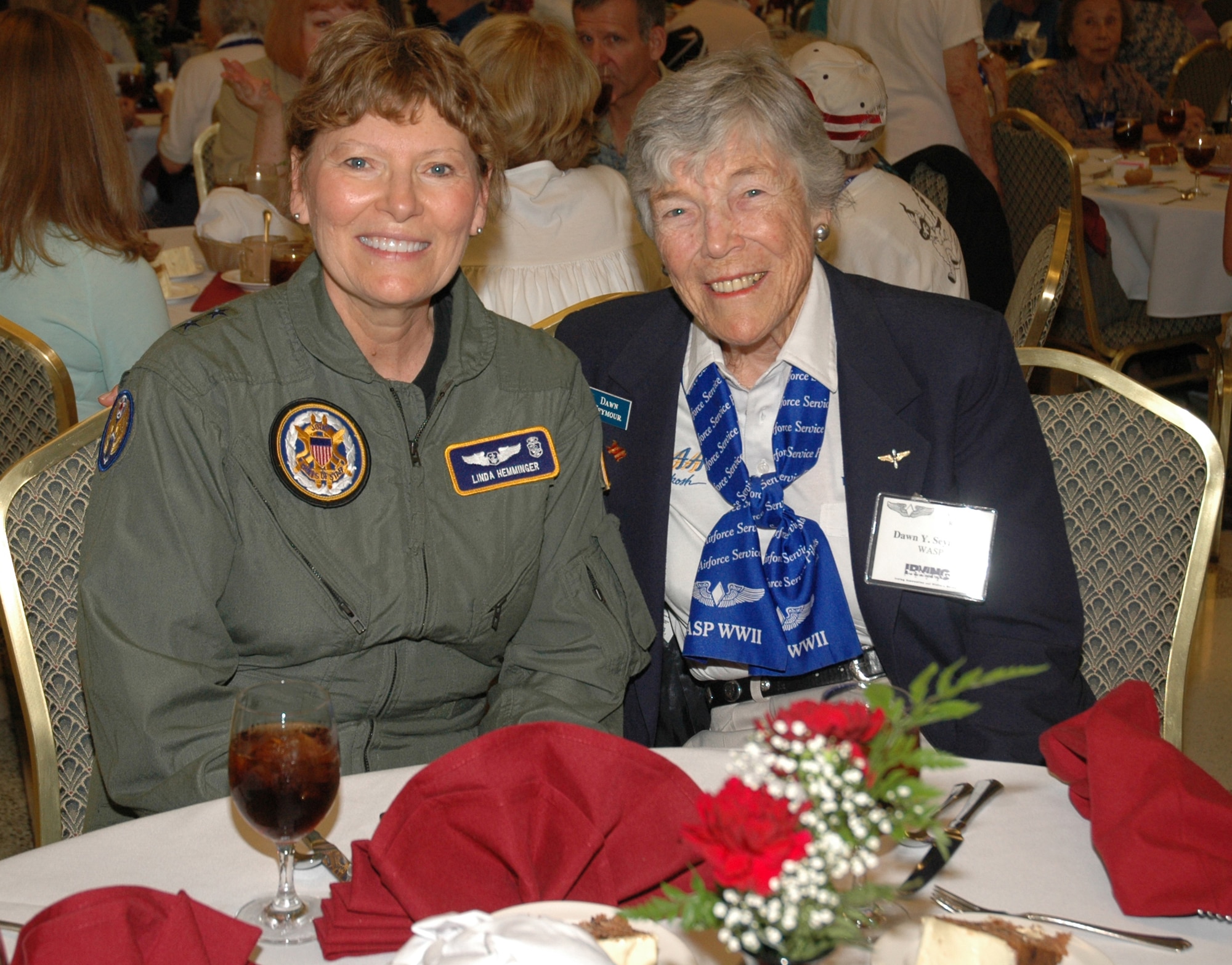Maj. Gen. Linda Hemminger and former WASP, Dawn Seymour enjoy lunch at the Texas Women's University WASP reunion. (U.S. Air Force Photo by Staff Sgt. Jay Ponder