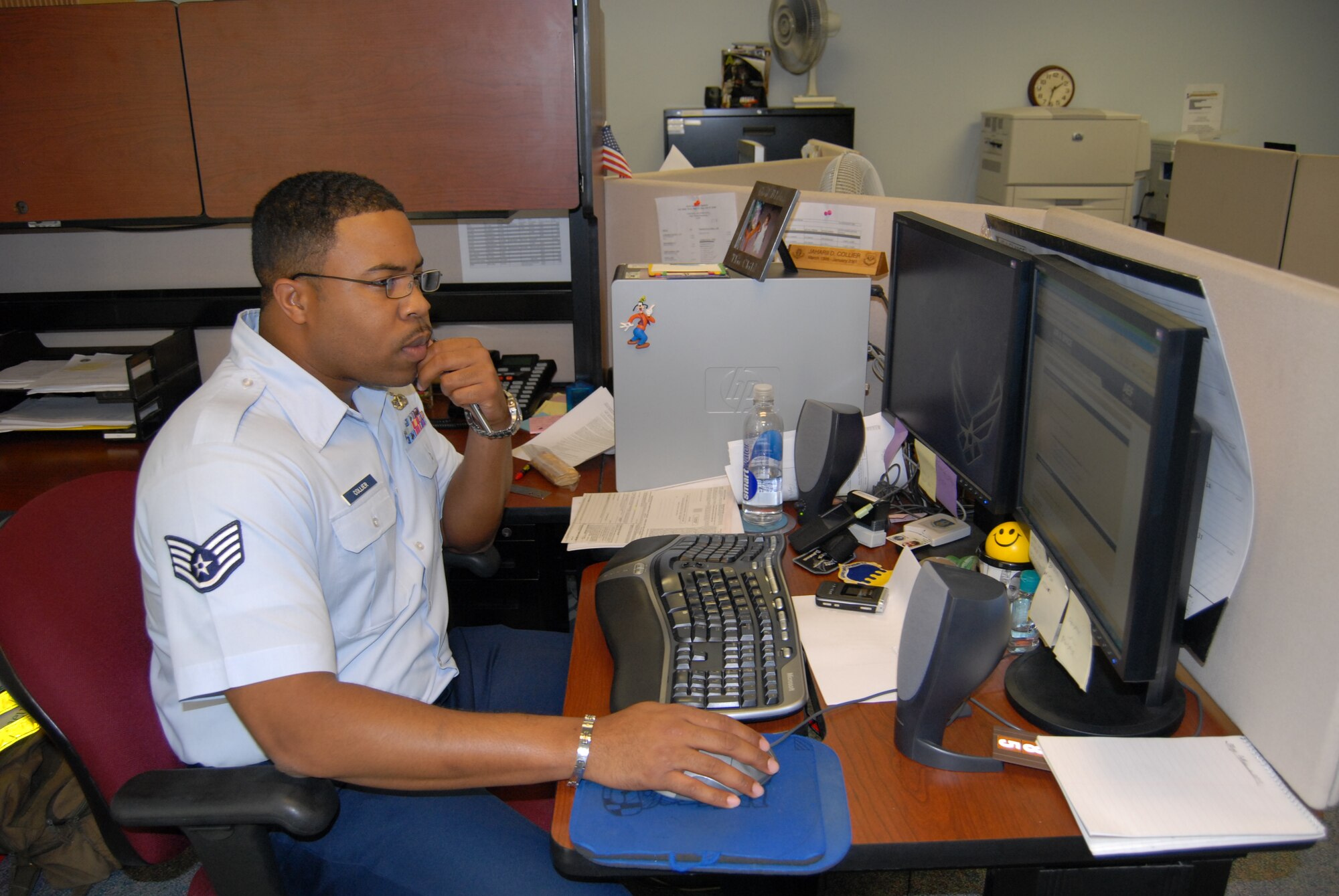 Staff Sgt. Jaharii Collier, 43rd Comptroller Squadron, certifies accounting documents in the newly instituted Database Expansion and Restructure System (DEARS). (U.S. Air Force Photo by Emily Smith)