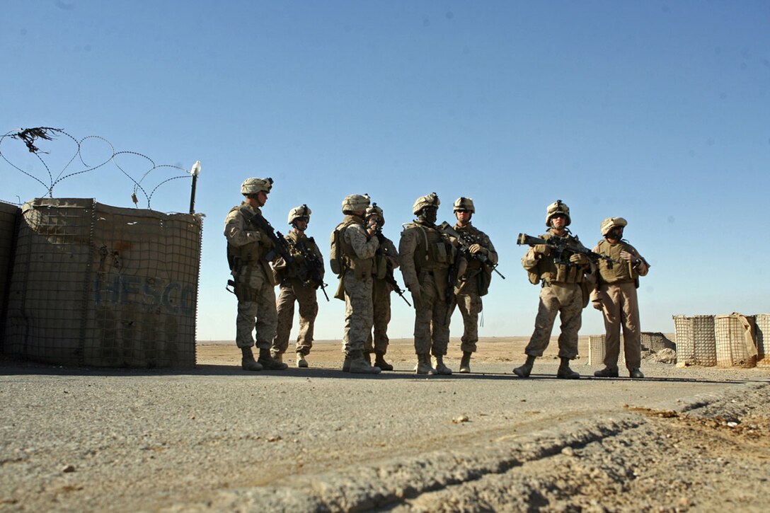 RAMADI, Iraq (Oct. 4, 2008) Marines of 1st Battalion, 9th Marine Regiment, Regimental Combat Team 1, make a stop at a Provincial Security Forces checkpoint Oct. 3, while helping Marines of 2nd Bn., 9th Marines become acquainted with the area of operations they will be covering during their seven month deployment.  (Official Marine Corps photo by LCpl. Jerry Murphy) (Released)
