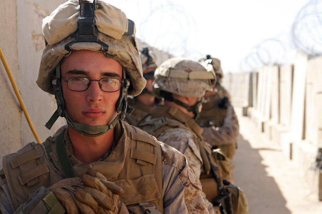 RAMADI, Iraq (Oct. 4, 2008) Cpl. Krystopher C. Tompkins, a squad leader with Company G, 2nd Battalion, 9th Marine Regiment, tours his new area of operations with Marines of 1st Bn., 9th Marines Oct. 3. (Official Marine Corps photo by LCpl. Jerry Murphy) (Released)