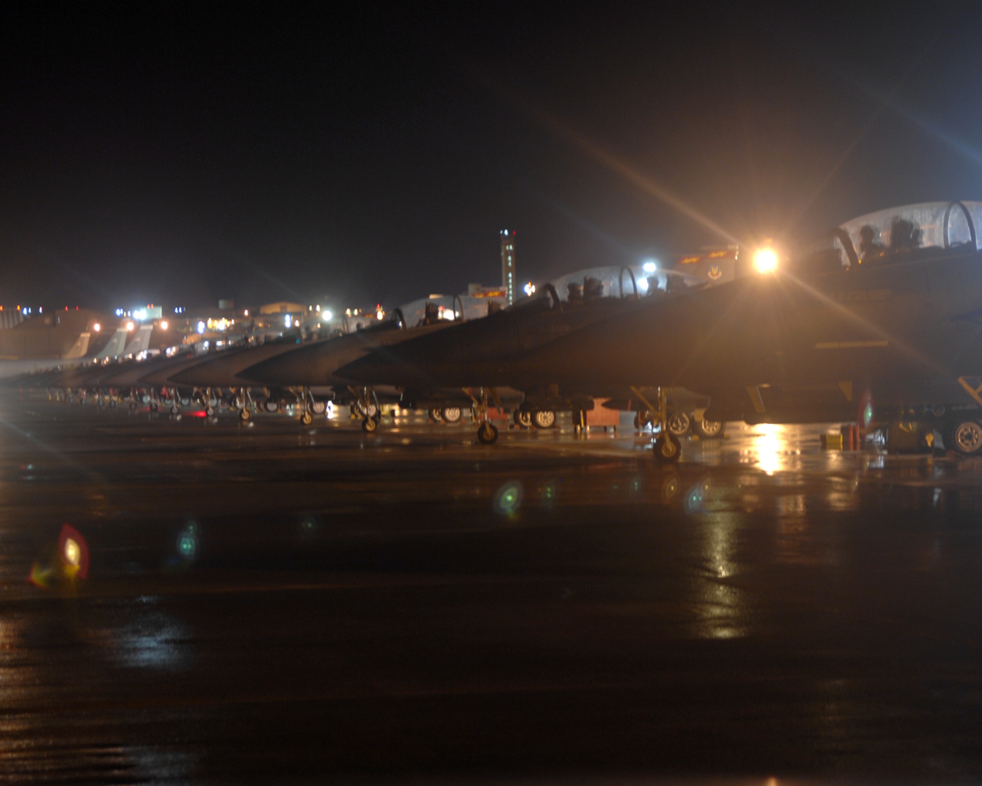 The 389th Expeditionary Fighter Squadron prepares F-15E Strike Eagles for departure Oct 4. The 389th EFS was deployed to Andersen as part of their scheduled AEF rotation to help ensure peace and security in the Western Pacific region. (U.S. Air Force photo by, Airman 1st Class Cory Todd)