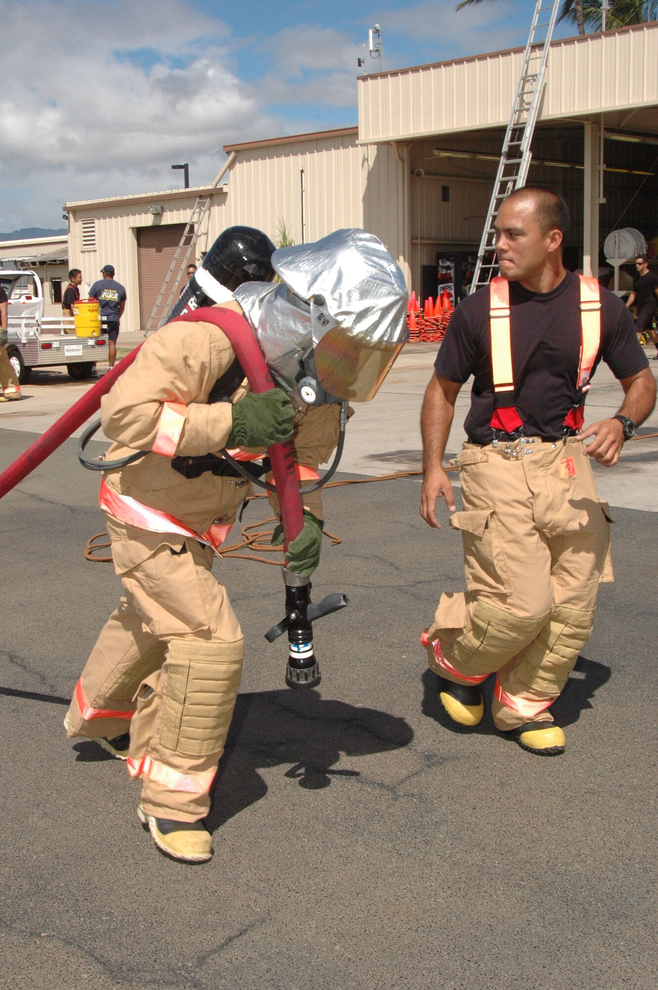 624th Civil Engineer fire fighters practice their critical skills through a ten station confidence course Oct. 10 Hickam Air Force Bases, Hawaii. The fire fighters demonstrated their ability to navigate obstacles, pull hoses, climb ladders and rescue victims within a limited time period. The 624th CES fire fighters are a part of the 624th Regional Support Group headquartered at Hickam.