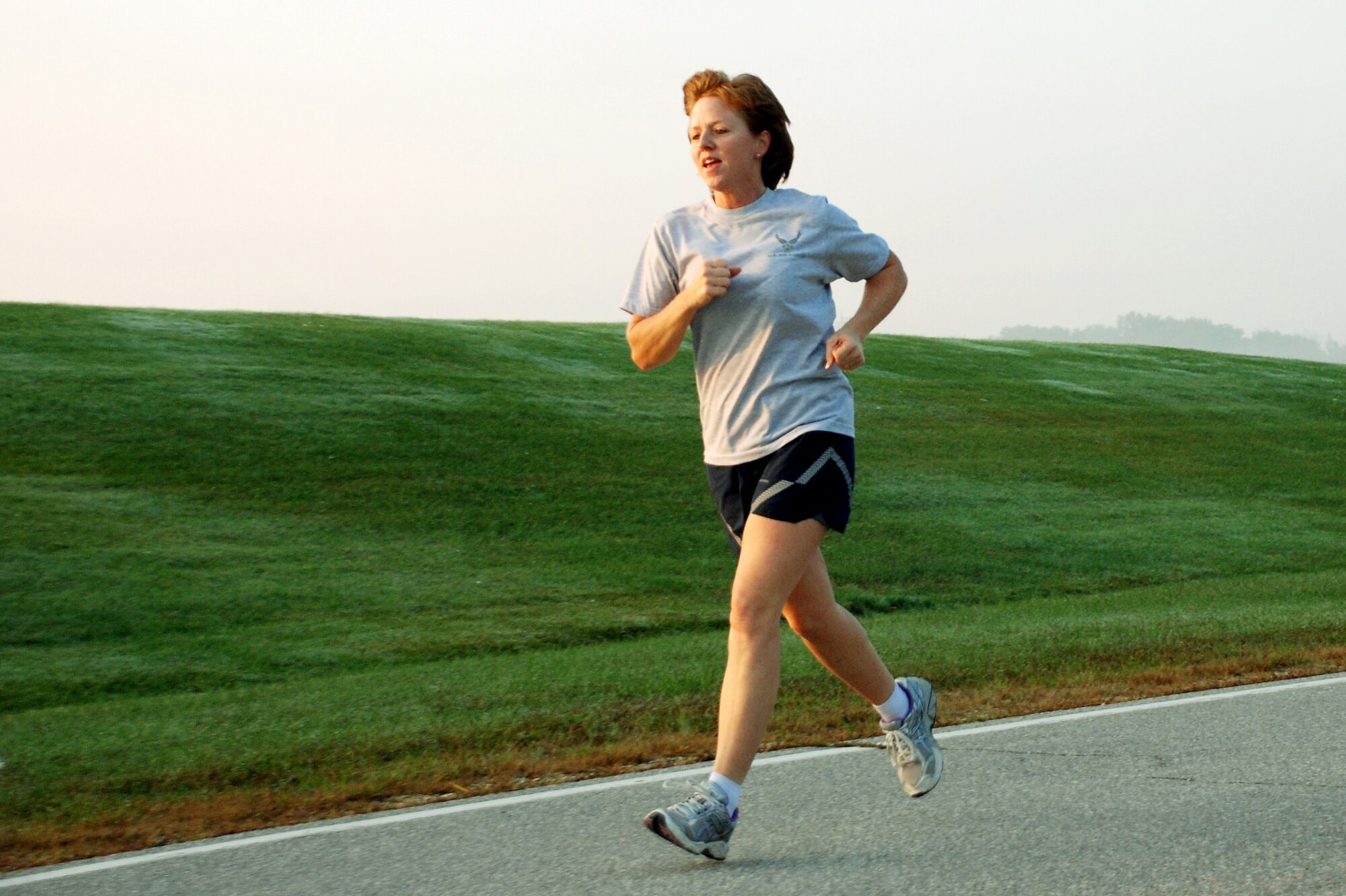 ANDREWS AIR FORCE BASE, Md. -- Chief Master Sgt. Patti Hickman, 459th Air Refueling Wing command chief, steps it up as she approaches the finish line during a chiefs and commanders run here Oct. 5. (U.S. Air Force photo/Tech. Sgt. Eric Sharman)