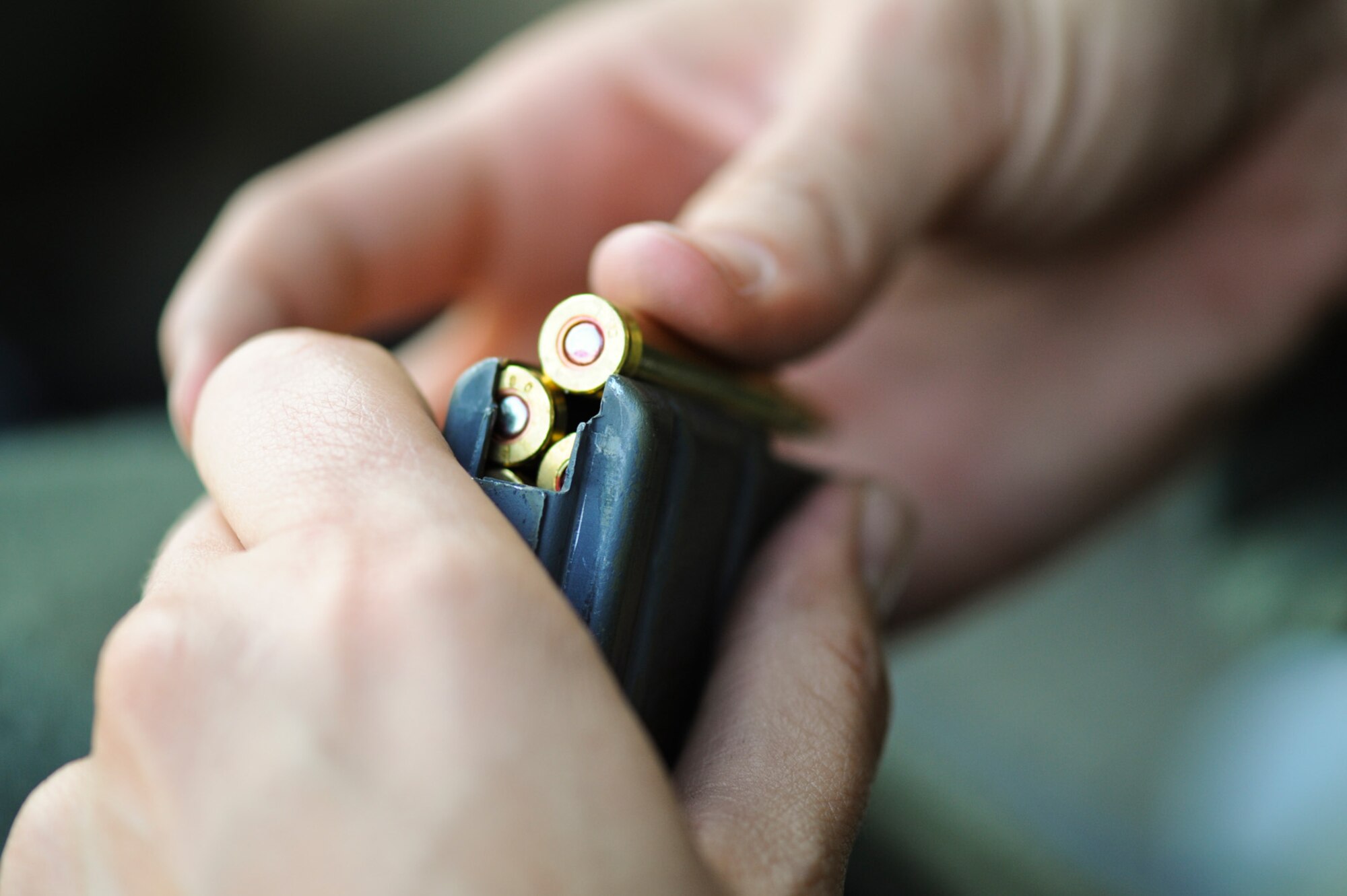 PATRICK AIR FORCE BASE, Fla. --  Air Force Reserve Tech. Sgt. Sara Pickens,  a HC-130P/N loadmaster for the 920th Rescue Wing, loads her final 5.56mm round before qualifying with the M-16 rifle during October's Unit Training Assembly at Patrick Air Force Base.  (U.S. Air Force photo / Tech. Sgt. Jeremy Allen)