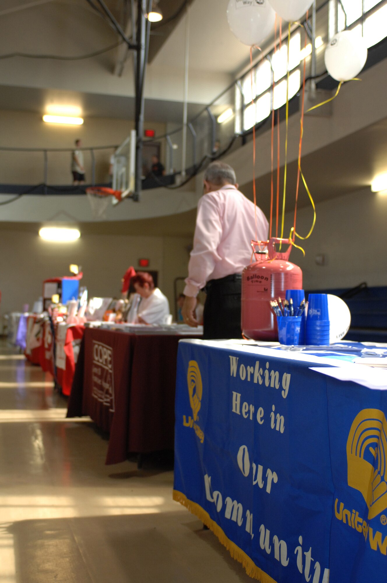 Many local charities and agencies, including organizations on Holloman Air Force Base, N.M., were set up in the gym of the Fitness and Sports Center as a part of the Combined Federal Campaign Kickoff, October 3. Airmen were invited to participate and learn about a few of the different organizations they can donate to through the CFC, as well as enjoy a free lunch. (U.S. Air Force photo/Airman Sondra M. Escutia)