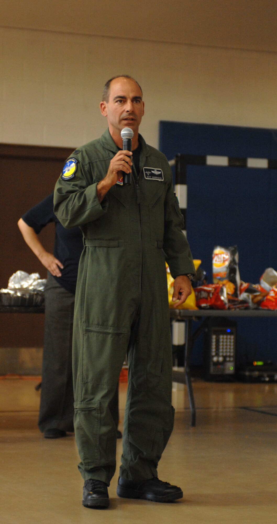 Col. Jeff Harrigian, 49th Fighter Wing commander, speaks at the annual Combined Federal Campaign Kickoff at the Fitness and Sports Center at Holloman Air Force Base, N.M., October 3. The CFC kickoff was celebrated with free hamburgers and hot dogs for all Airmen who attended. The goal for Holloman this year is $70,000. (U.S. Air Force photo/Airman Sondra M. Escutia)