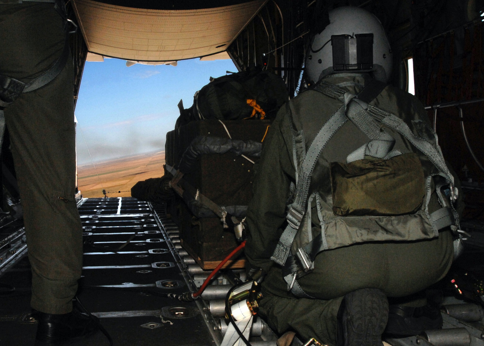 Airman 1st Class William Kersey prepares to pull the manual release lever on the bomb rack iin case the electrical release system does not work aboard an MC-130W aircraft Sept. 24. This kind of drop would be performed in a drop zone where landing is not an option. Airman Kersey is a loadmaster from the 73rd Special Operations Squadron. (U.S. Air Force photo/Airman Maynelinne De La Cruz)