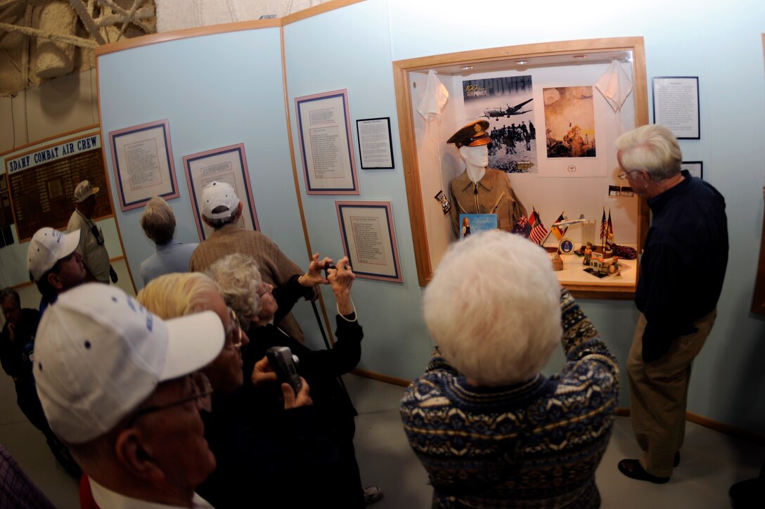 Members of the Berlin Airlift Veterans Association look at one of the memorials to commemorating the 60th anniversary of the Berlin Airlift at the South Dakota Air and Space Museum, Oct. 3.  The memorial was dedicated to retired Air Force Lt. Col. Charles Childs, a member of the Berlin Airlift forces and resident of Rapid City, S.D. (U.S. Air Force photo/Airman Matthew Flynn)