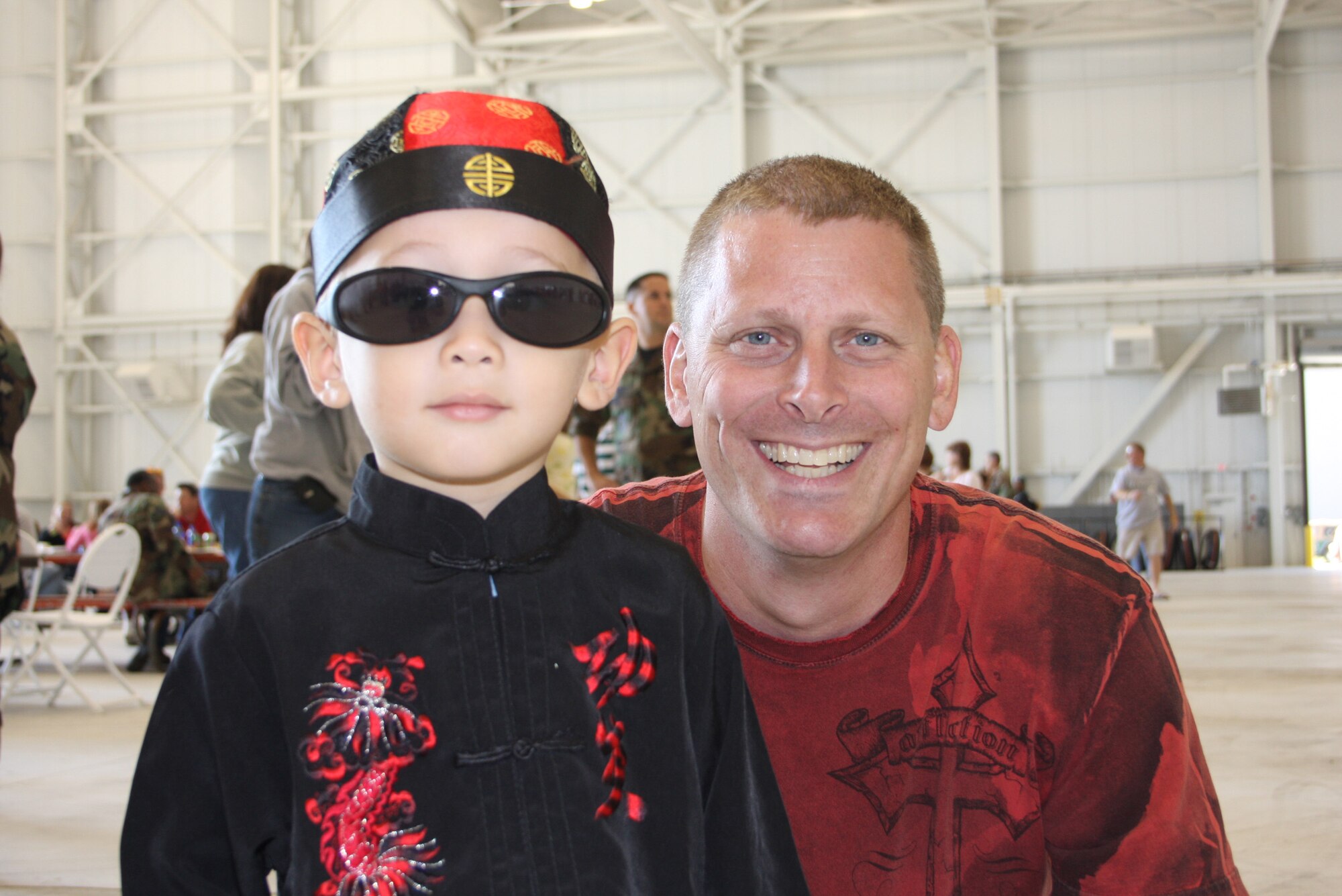 WRIGHT-PATTERSON AFB, Ohio - Staff Sgt. Michael Benzing, 445th Aircraft Maintenance Squadron, enjoys spending time with his son Nathan during the 445th Airlift Wing's annual picnic Oct. 5, 2008.  The picnic was open to all wing members, their families and friends and was sponsored by the Chiefs Group. (Air Force photo/Senior Airman Ken LaRock)