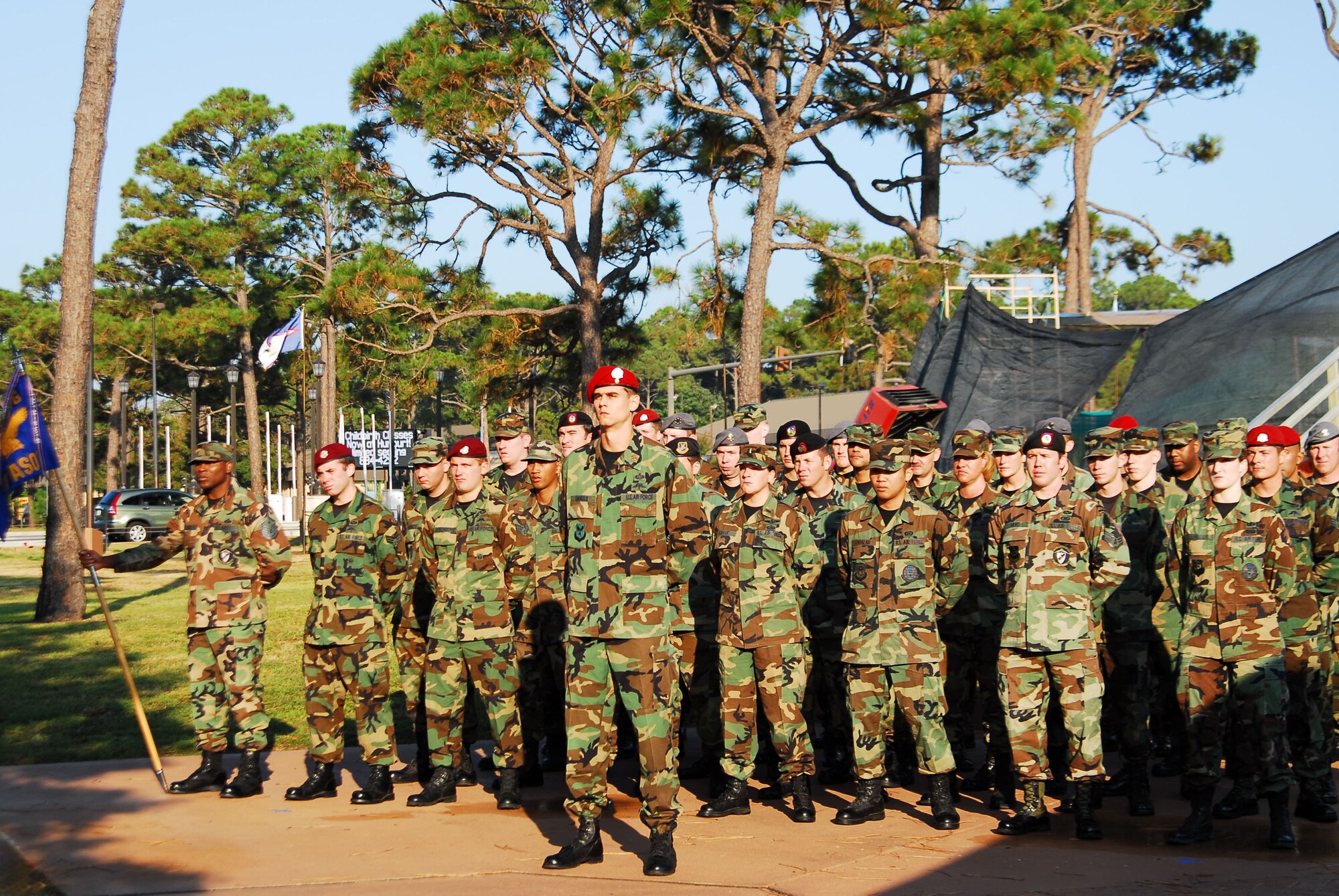 Airmen from the 720th Special Tactics Group stand at parade rest during the 17th Air Support Operations Squadron transition ceremony, signifying the transfer from Air Combat Command to Air Force Special Operations Command. (U.S. Air Force photo/Senior Airman Shelia DeVera)