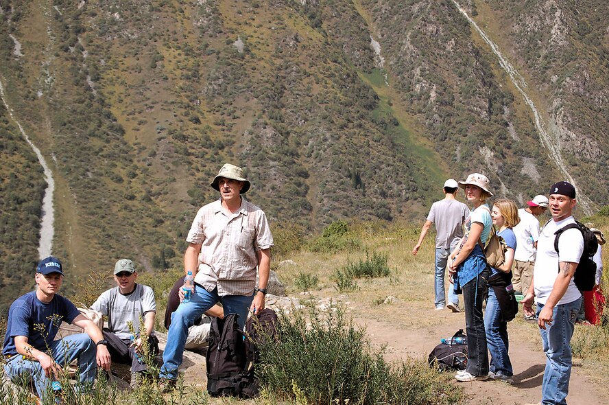 Manas servicemembers take a breather during a hike through Kyrgyzstan's Ala Archa Gorge and National Park. Deployed servicemembers to Manas have a unique opportunity through the base International Tours and Travel office to frequent more than 40 locations ranging from hiking, horseback and dining trips throughout Kyrgyzstan and the city of Bishkek. (U.S. Air Force photo/Maj. Damien Pickart)