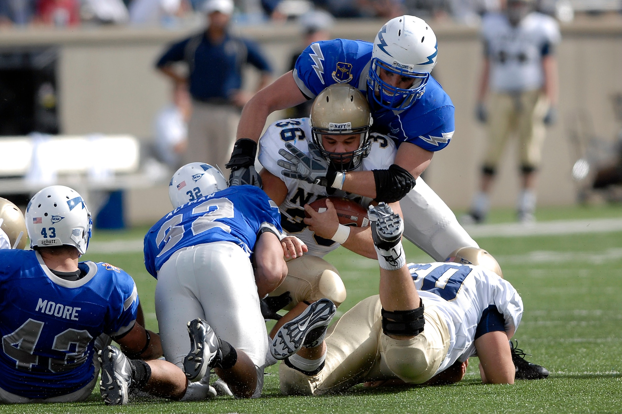 Navy fullback Eric Kettani is tackled during second quarter action as Navy defeated the Falcons 33-27 at the Academy in Colorado. Air Force came up short Oct. 4 in their quest to reclaim the Commander-in-Chief's trophy. (U.S. Air Force photo/Dave Ahlschwede)