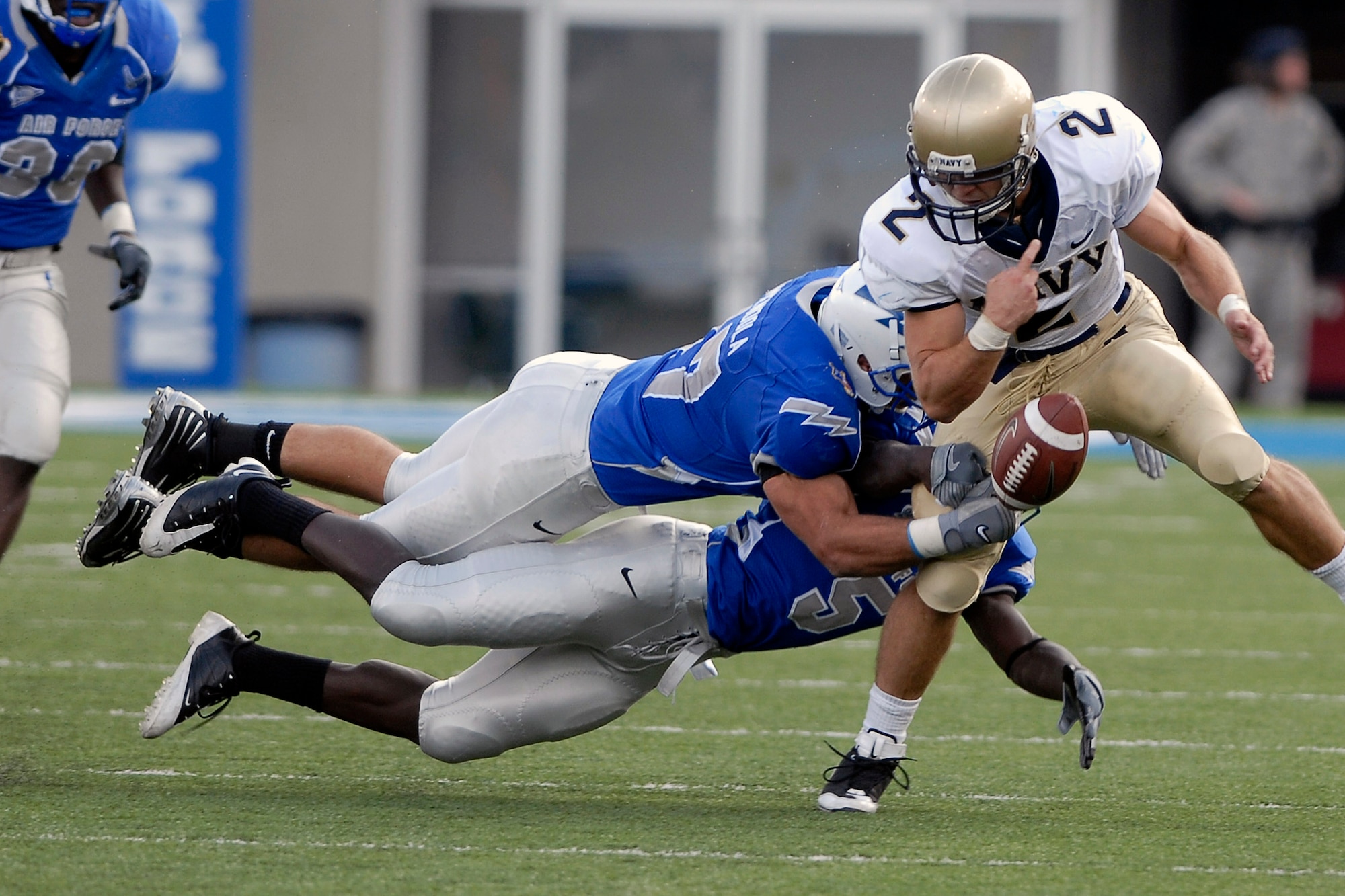 Navy quarterback Jarod Bryant loses the ball to the Falcon defense as Navy beat the Falcons 33-27 at the Academy in Colorado Oct. 4. (U.S. Air Force photo/Dave Ahlschwede)