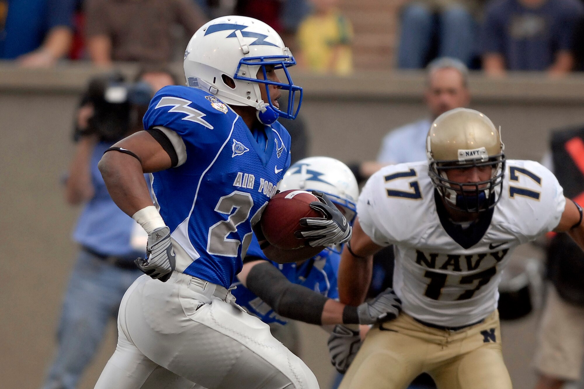 U.S. Air Force Academy sophomore tailback Kyle Lumpkin gains yardage as Navy beat the Falcons for the 6th consecutive time, 33-27 at the Academy in Colorado Oct. 4. (U.S. Air Force photo/Dave Ahlschwede)