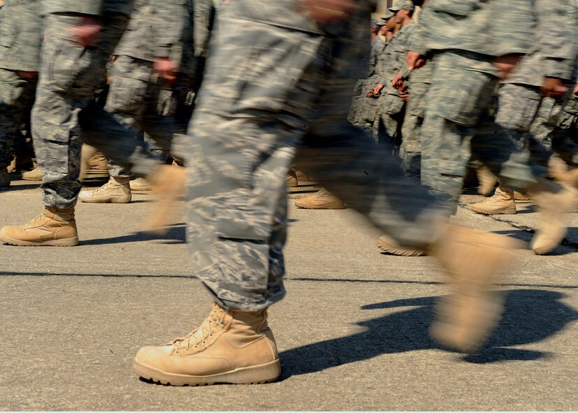 MOODY AIR FORCE BASE, Ga. -- Members of the 822nd Security Forces Squadron march in formation before being released to see their family members and loved ones during a welcome home ceremony here Oct. 4. The 822nd SFS returned from a deployment in Iraq. (U.S. Air Force photo by Senior Airman Brittany Barker)