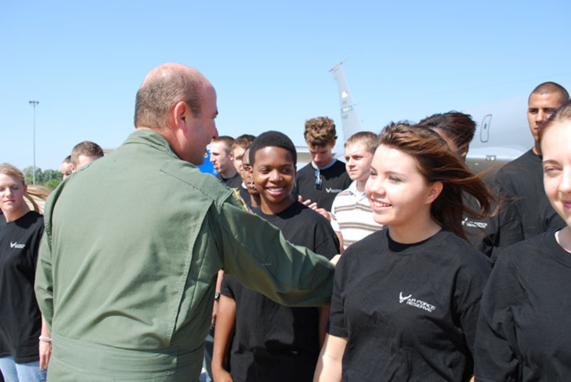 Col. Jeffery R. Glass, 507th Air Refueling Wing commander welcomes 25 new recruits into the Air Force Reserve Command immediately following their taking the oath of enlistment during a mass enlistment ceremony in front of a KC-135R here at Tinker Air Force Base October 5.  These new recruits will be assigned to either the Air Force Reserve Command's 507th Air Refueling Wing or 513th Air Control Group upon graduation from basic training and technical school.