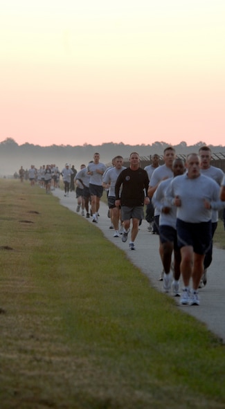 MOODY AIR FORCE BASE, Ga. – Airmen head towards the finish line during the violence prevention month five-kilometer run/walk here Oct. 3. The course led Airmen from the gym, past the flight line, and back to complete the 5K. (U.S. Air Force photo by Airman Joshua A. Green) 