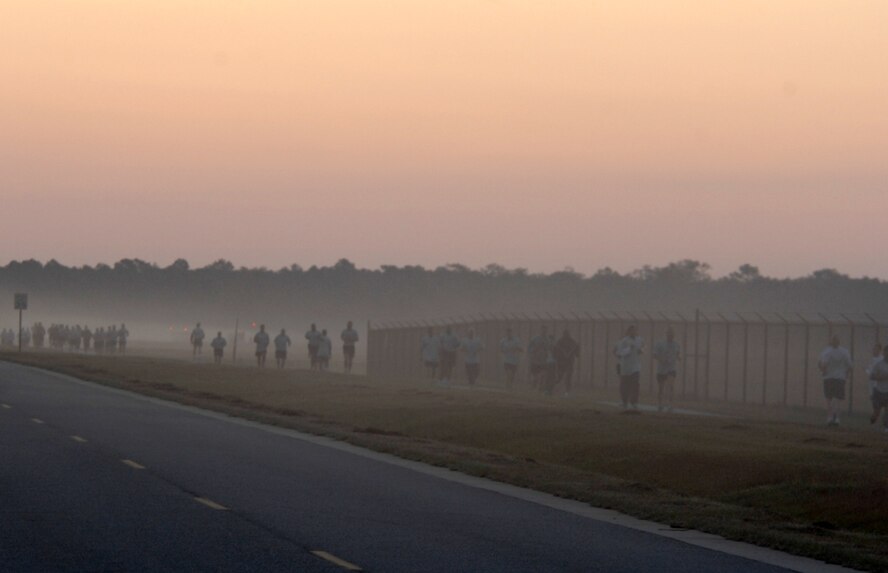 MOODY AIR FORCE BASE, Ga. – Airmen supporting violence prevention month run through the morning fog during a five-kilometer run here Oct. 3. (U.S. Air Force photo by Airman Joshua A. Green) 