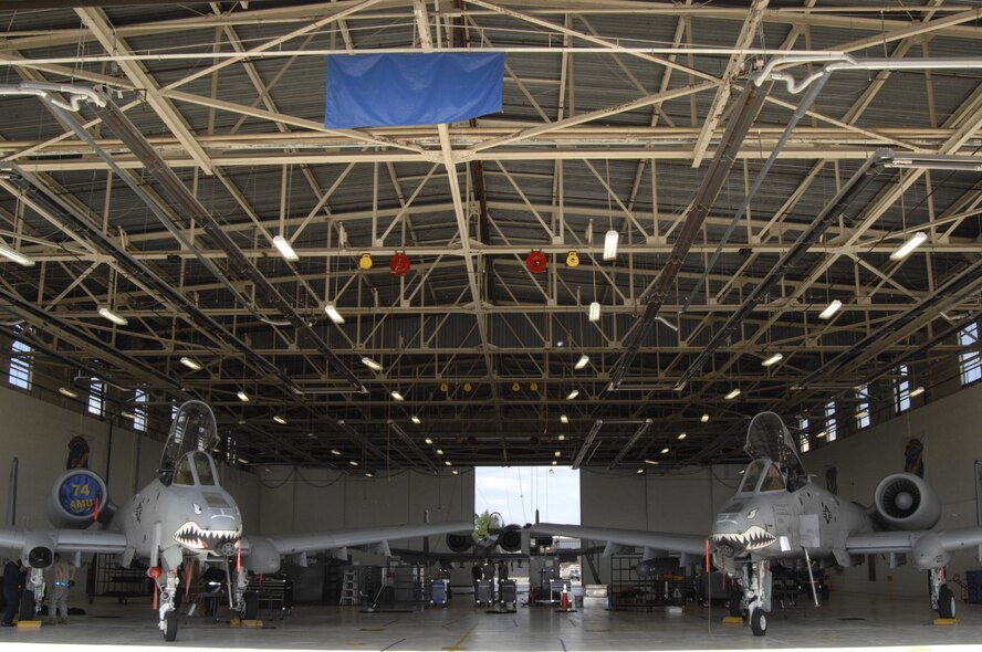 MOODY AIR FORCE BASE, Ga. -- After identifying structural cracks on thin skinned A-10s and A-10C Thunderbolt II models the Air Combat Command has issued a systematic grounding of certain affected airframes by corresponding tail number here Oct. 4. The risk of structural damage to wings of A-10 models was discovered at Hill Air Force Base, UT., while A-10 models were undergoing a service life extension program and scheduled structural inspection programmed visits. (U.S. Air Force Photo taken by SrA Javier Cruz)