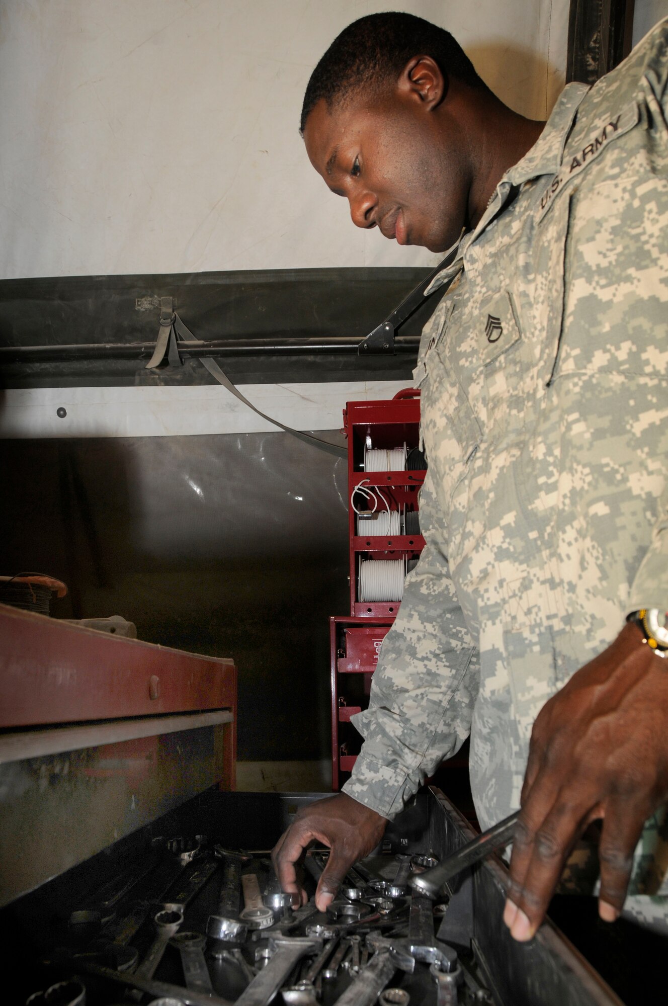 Army Staff Sgt. Tyren Young, motor sergeant apprentice assigned to Alpha 243, conducts inventory of his toolbox Oct. 4, 2008.  Alpha 243 provides early warning and air defense support for personnel and resources at this undisclosed air base in Southwest Asia.  Sergeant Young, a native of Tampa, Fla., is deployed from Fort Bliss, Texas, in support of Operations Iraqi and Enduring Freedom and Joint Task Force-Horn of Africa. (U.S. Air Force photo by Staff Sgt. Darnell T. Cannady/Released)