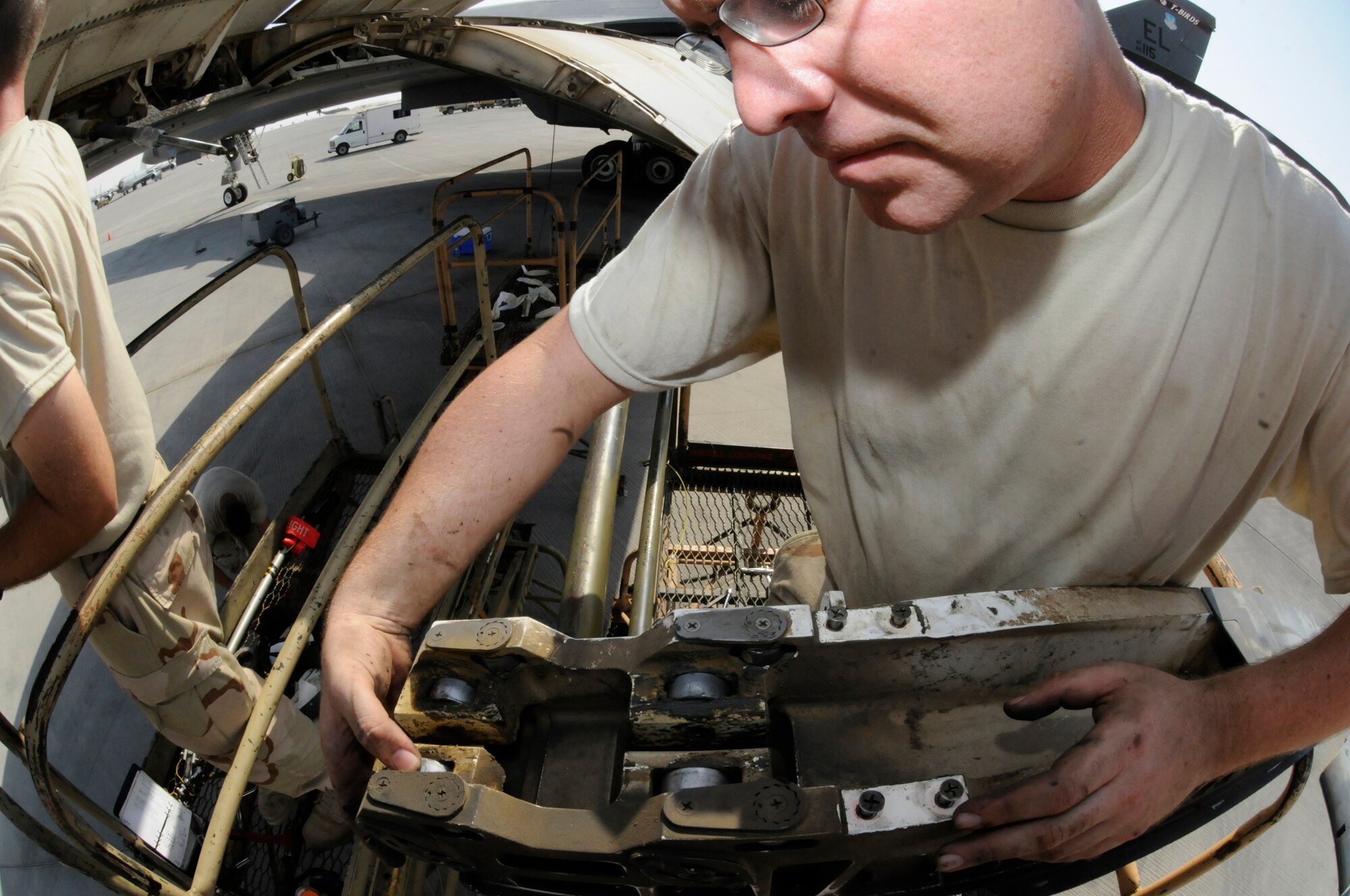 Tech. Sgt. Shaun Carroll, 379th Expeditionary Aircraft Maintenance Squadron, 34th Aircraft Maintenance Unit, does an operations check on a removed flap carriage October 5, 2008.  A maintenance crew is pulling the flaps from the B-1 Lancer in order to troubleshoot a flap lock-up problem at an undisclosed air base in Southwest Asia.  The B-1 is often called upon to deliver precision weapons in support of ground troops engaged in Operations Iraqi and Enduring Freedom.  Sergeant Carroll, hailing from Charleston, S.C., is deployed from Ellsworth Air Force Base, S.D.  (U.S. Air Force photo by Tech. Sgt. Michael Boquette/Released)