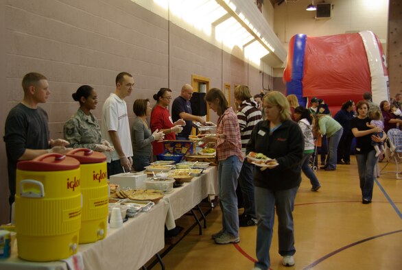 Air Commando volunteers provided and manned a buffet-style dining experience to valued Team Mildenhall spouses during a Hearts Apart event Sept. 25, 2008 at RAF Mildenhall, England. (U.S. Air Force photo by Tech. Sgt. Hubert Hawkins)  