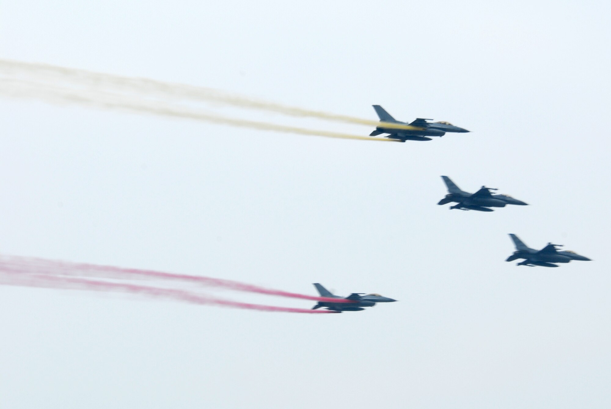 KUNSAN AIR BASE, Republic Of Korea -- F-16 Fighting Falcons and Republic of Korea Air Force F16Ks fly together in a friendship flight to start the second and final day of the Gunsan partnership Air Show here, Oct. 5.The City of Gunsan, 8th Fighter Wing and Republic of Korea Air Forces’ 38th Fighter Group hosted the first  partnership Air Show in Gunsan, Oct. 4-5. (U.S. Air Force photo by: Senior Airman Angela Ruiz)