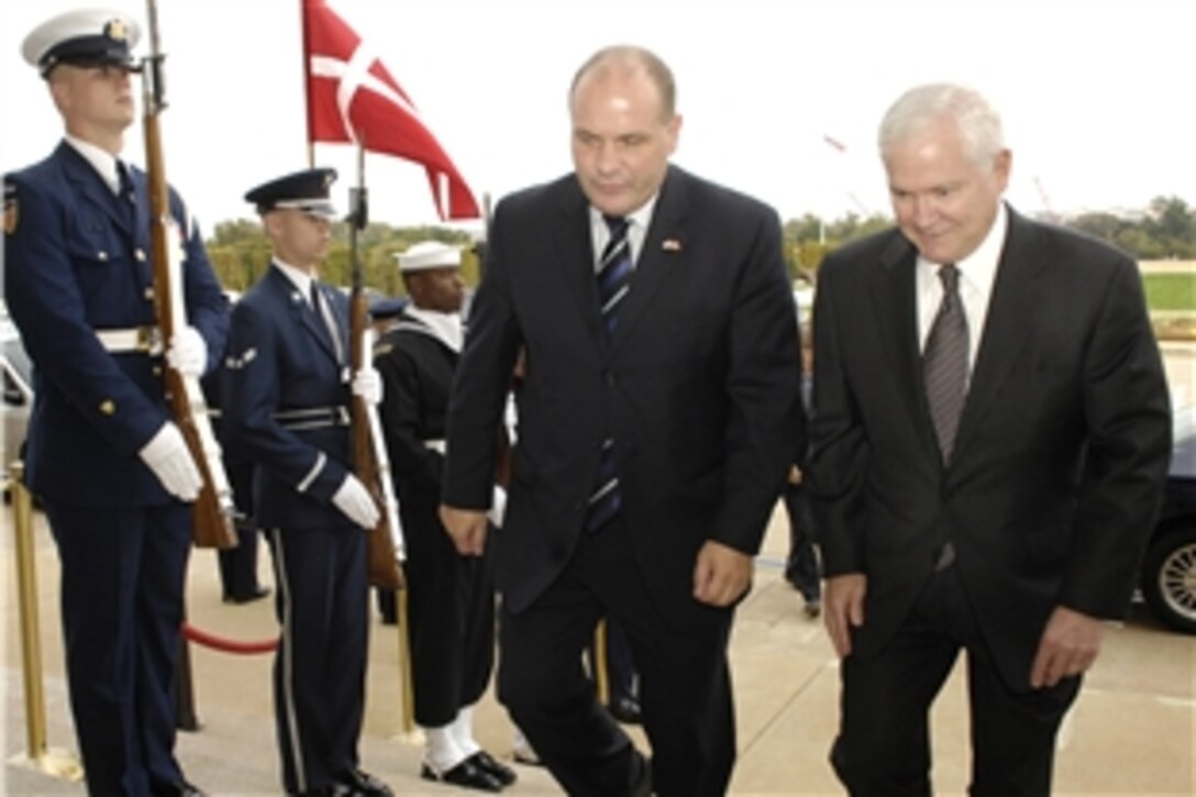 Defense Secretary Robert M. Gates, right, escorts Danish Minister of Defense Soren Gade through an honor cordon into the Pentagon, Oct. 6, 2008, to meet on bilateral defense issues.