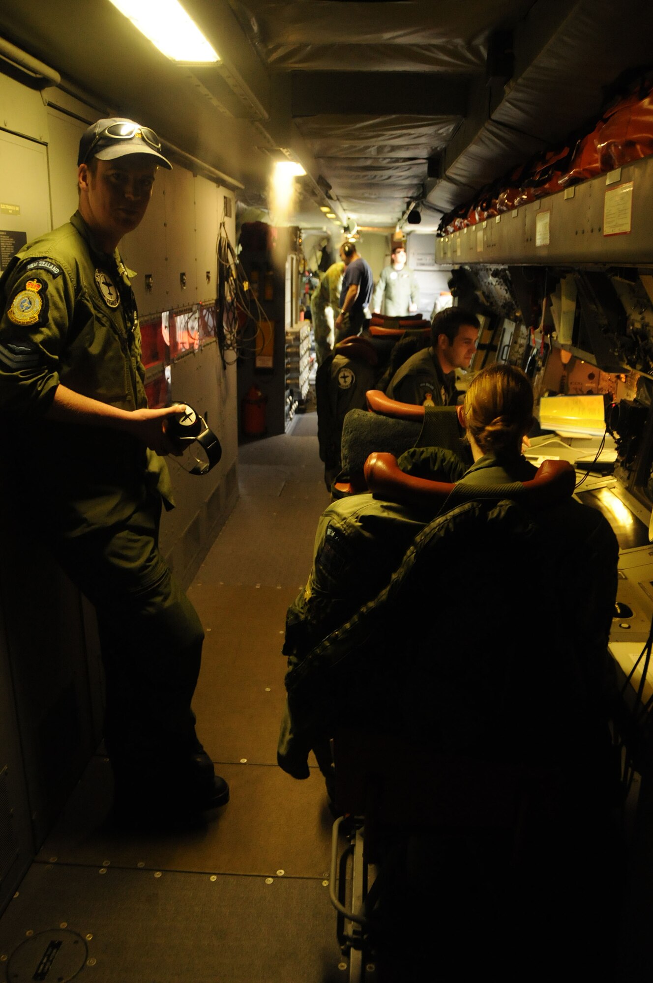 ANDERSEN AIR FORCE BASE, Guam - A Royal New Zealand air force members check their computer systems after their arrival here Oct. 7. The Royal New Zealand air force members are here to participate in "Operation Island Chief,” a joint exercise with the U.S Navy and U.S. Coast Guard. (U.S. Air Force photo by Airman 1st Class Courtney Witt)