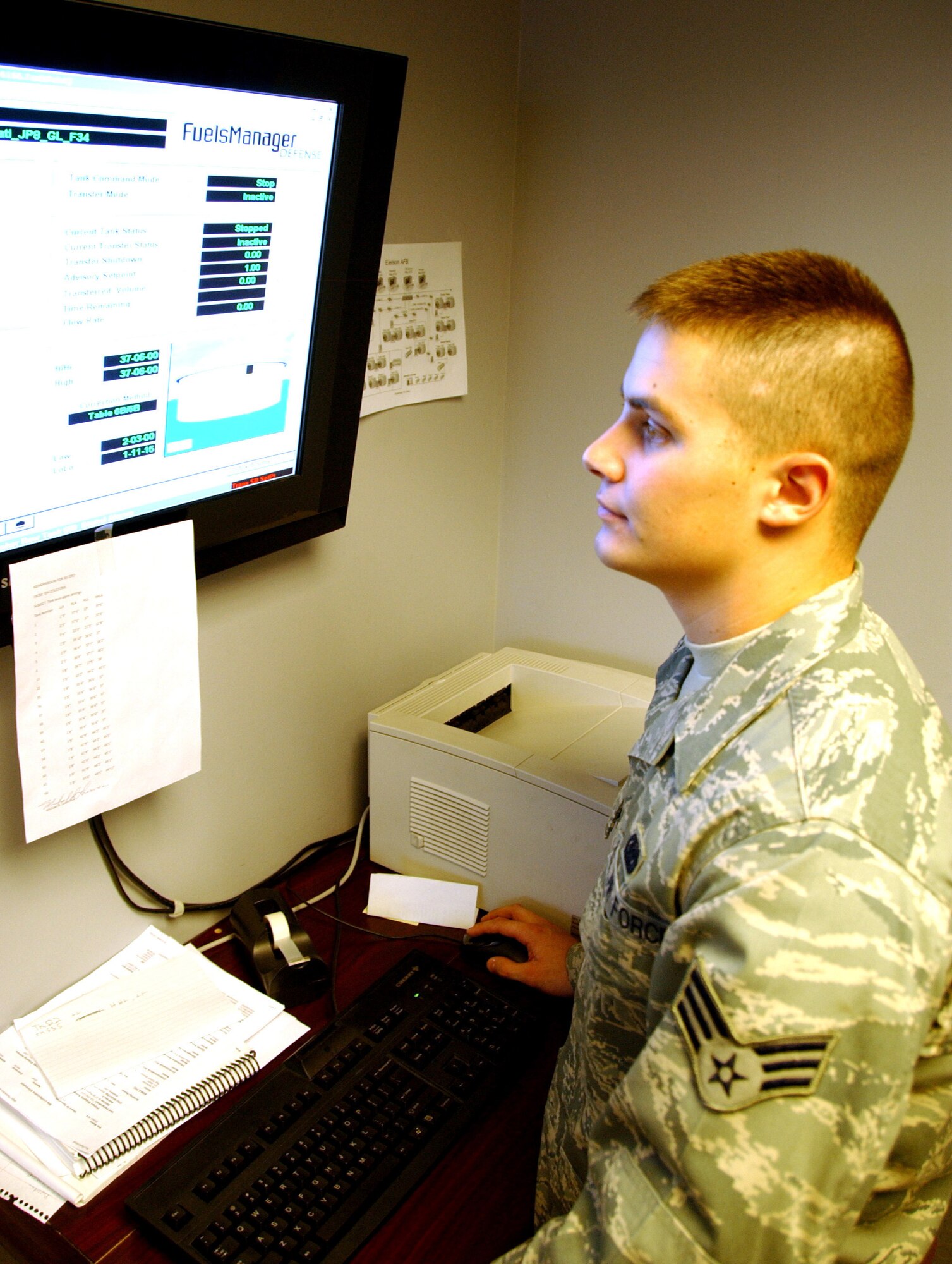 Senior Airman Jack Bennett observes tank information on the fuels manager Oct. 6, 2008, at Eielson Air Force Base, Alaska. The fuels manager maintains the fuels at Eielson AFB. Airman Bennett is a member of the 354th Logistics Readiness Squadron fuels management flight. (U.S. Air Force photo by Airman Laura Max)                               