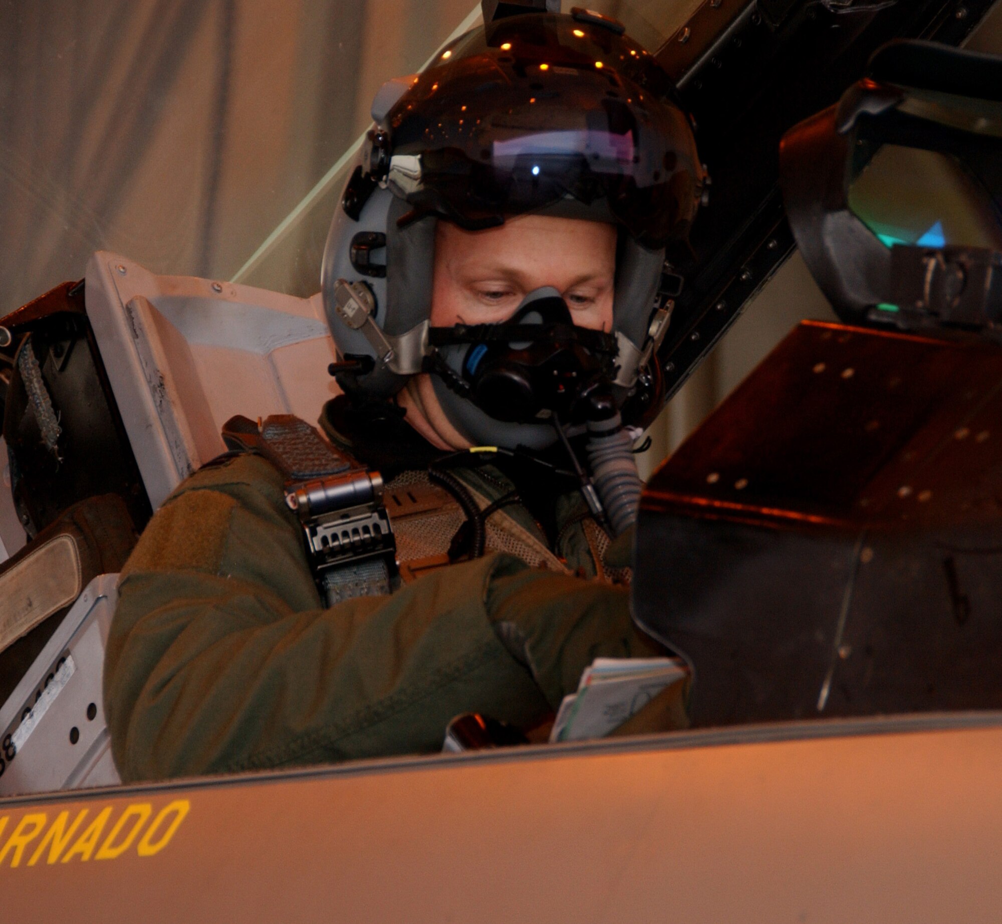 An F-16 fighter pilot reads over a final checklist before take-off 
Oct.6, 2008 Eielson Air Force Base, Alaska. The Wolf Pack is here from the 80th AMU Kunsan Air Base, Alaska for Red Flag-Alaska 09-1. (U.S. Air Force Photo by Airman Laura Max)
                               