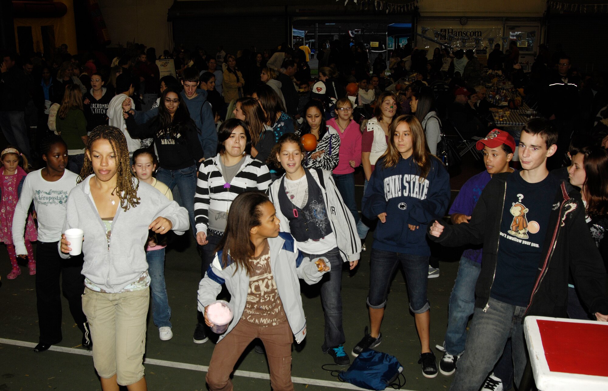 HANSCOM AFB, Mass. – Oktoberfest attendees participate in a line dance during the Oct. 3 event at the Tennis Bubble. The 66th Services Squadron hosted Oktoberfest which featured a variety of food, entertainment and activities for members of the Hanscom community.  (U.S. Air Force photo by Linda LaBonte Britt)