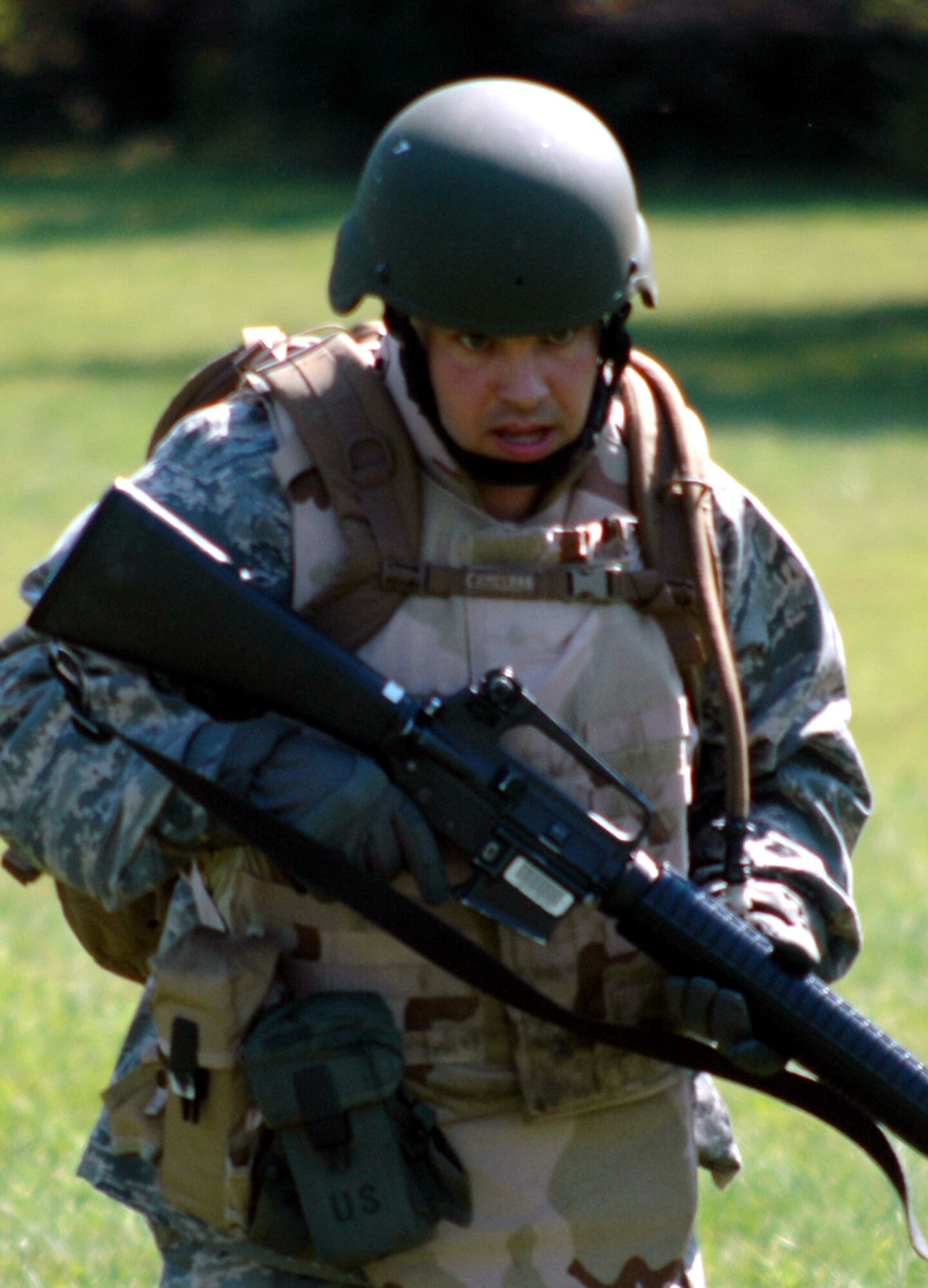 Maj. Michael Davide, from Peterson Air Force Base, Colo., runs to "get on line" for a battle drill during the basic field tactics day for the Advanced Contingency Skills Training (ACST) Course 09-1 on a Fort Dix, N.J., range Oct 4, 2008.  ACST is taught by the U.S. Air Force Expeditionary Center's 421st Combat Training Squadron at Fort Dix and in fiscal 2008 prepared more than 1,500 Airmen for deployments. (U.S. Air Force Photo/Staff Sgt. Paul R. Evans)