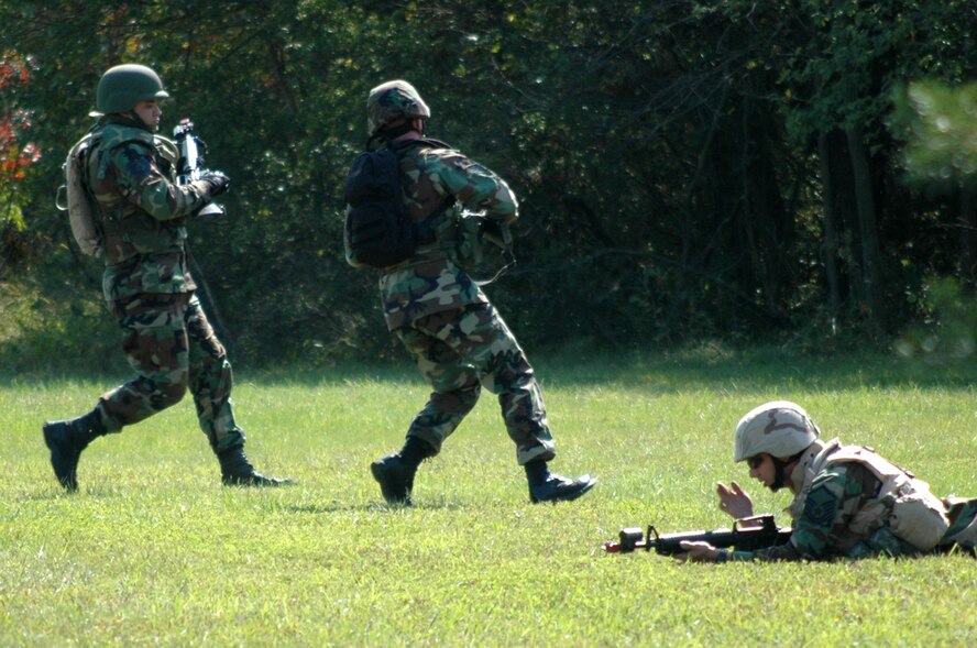 Students from the Advanced Contingency Skills Training Course 09-1 practice basic field tactics during training on a Fort Dix, N.J. range Oct 4, 2008.  ACST is taught by the U.S. Air Force Expeditionary Center's 421st Combat Training Squadron at Fort Dix and in fiscal 2008 prepared more than 1,500 Airmen for deployments. (U.S. Air Force Photo/Staff Sgt. Paul R. Evans)