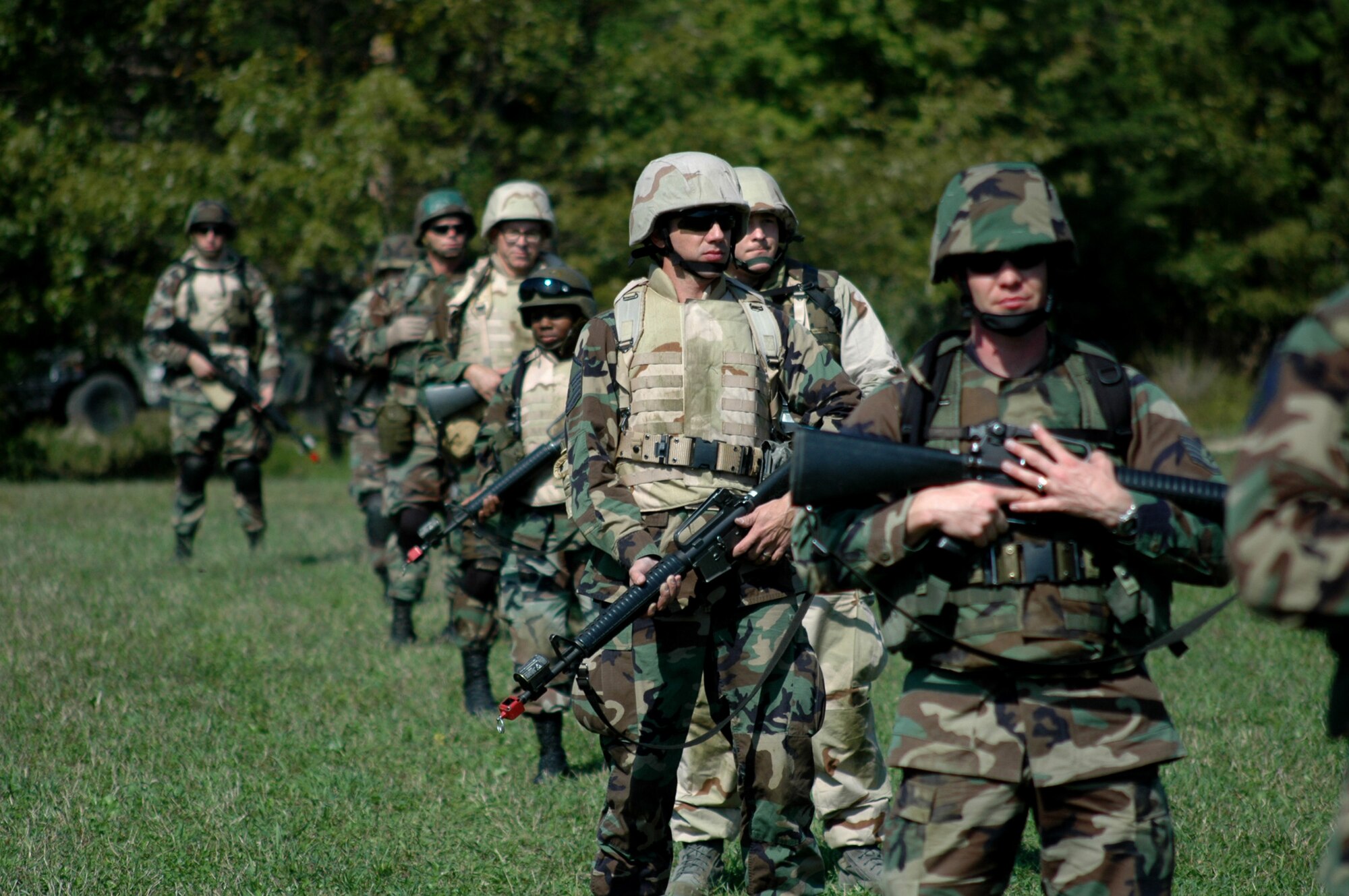 Students from the Advanced Contingency Skills Training Course 09-1 practice basic field tactics during training on a Fort Dix, N.J. range Oct 4, 2008.  ACST is taught by the U.S. Air Force Expeditionary Center's 421st Combat Training Squadron at Fort Dix and in fiscal 2008 prepared more than 1,500 Airmen for deployments. (U.S. Air Force Photo/Staff Sgt. Paul R. Evans)